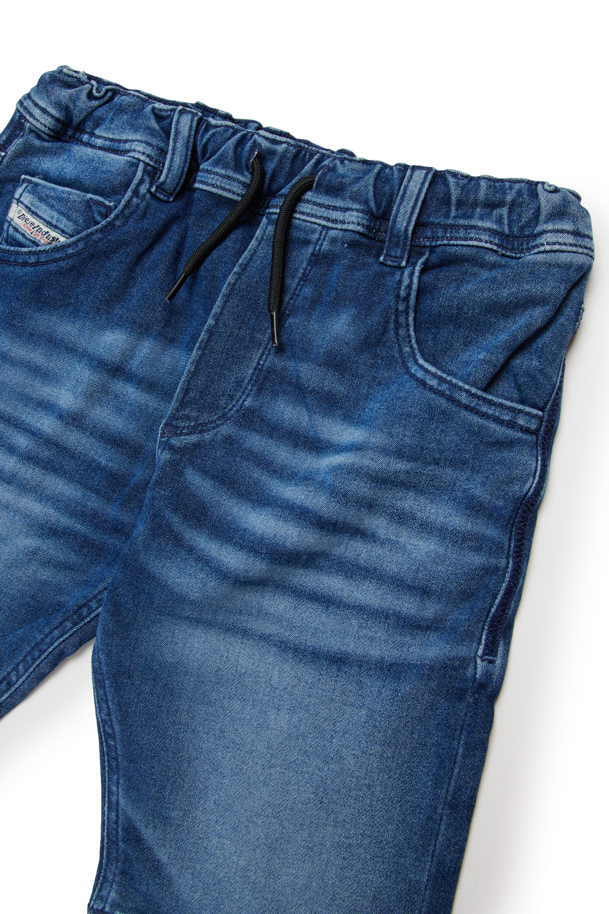 JoggJeans® shorts in mid-blue with shades