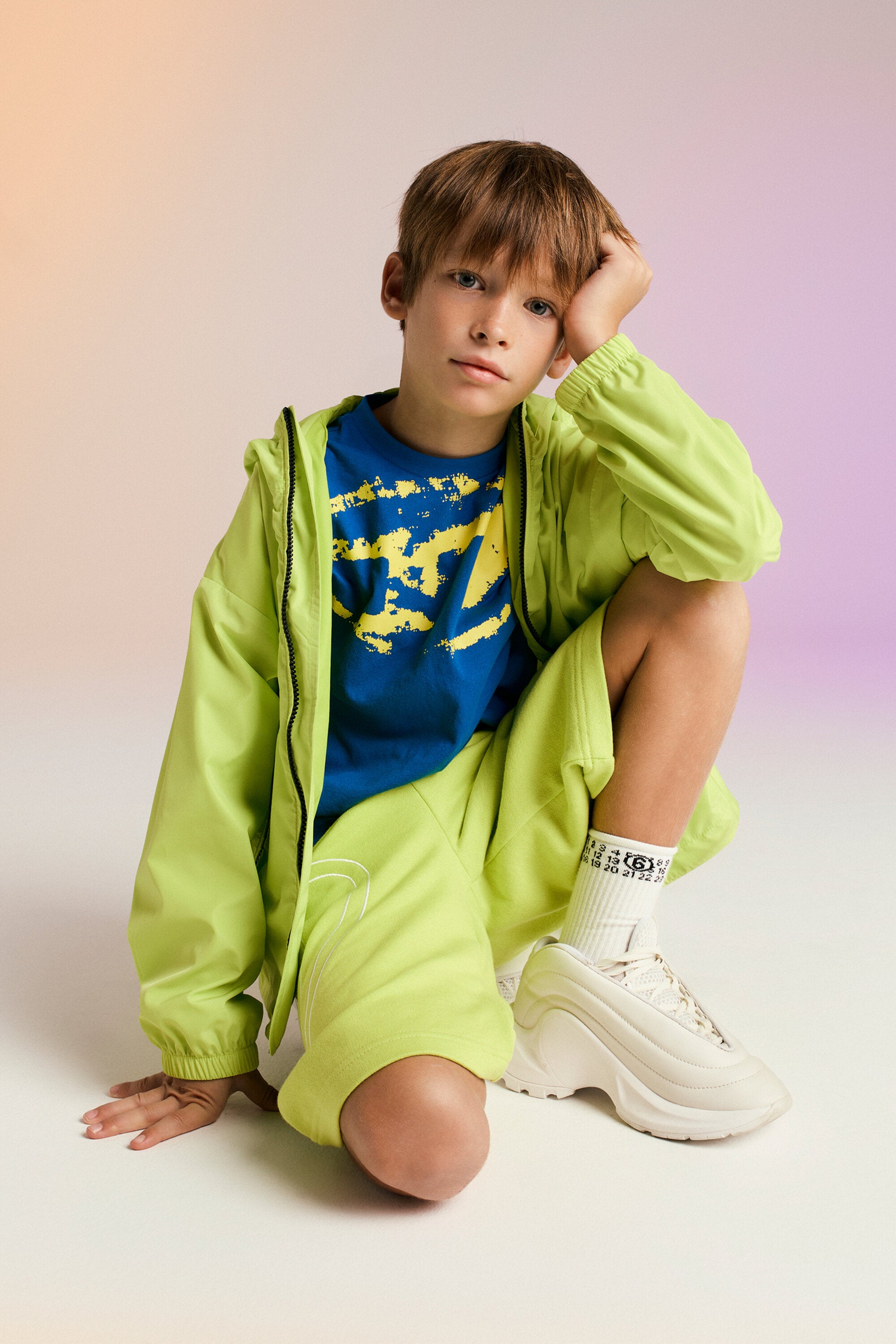 Mid D-Runner trainers branded with Oval D logo