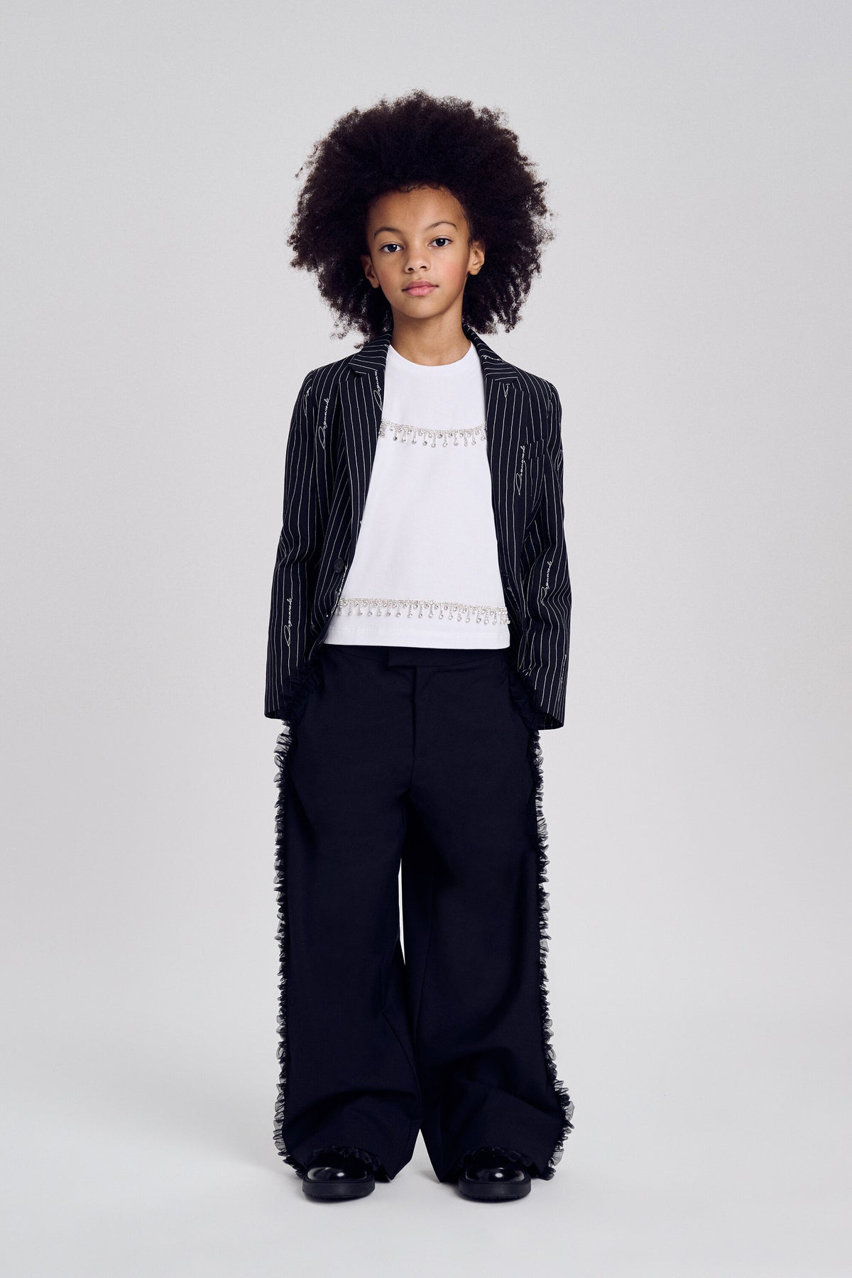 Formal pants with pleated inserts