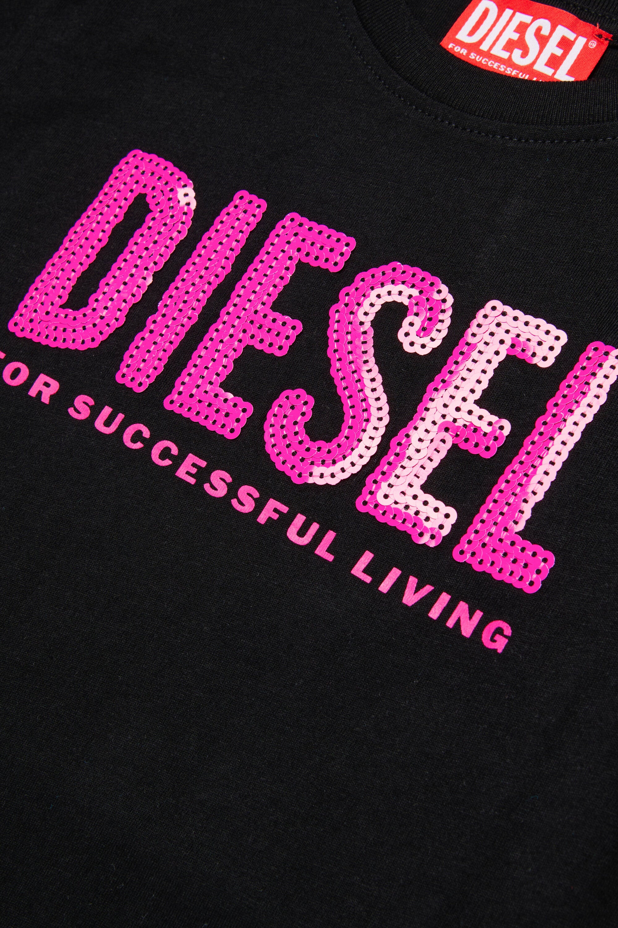 T-shirt with sequin logo