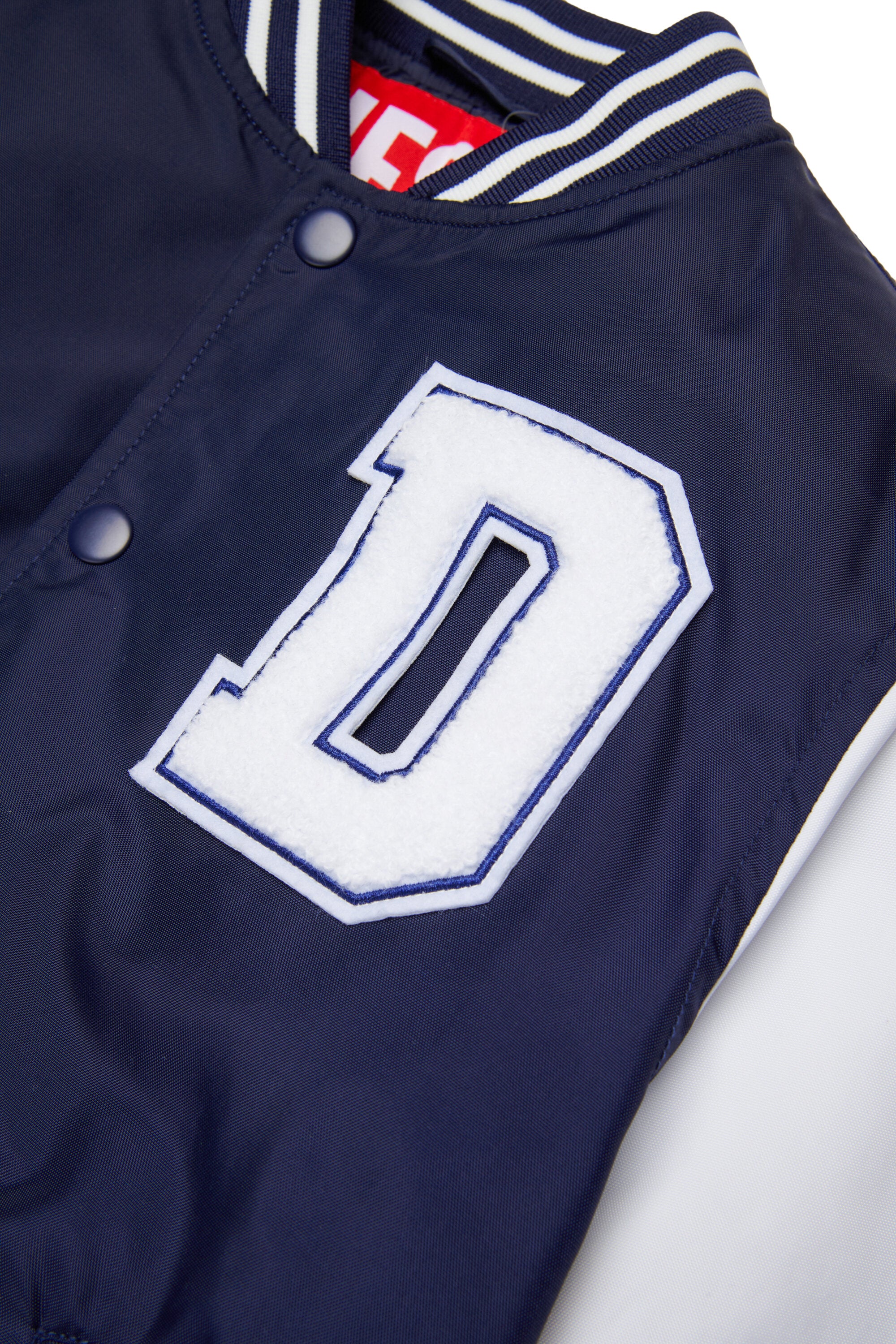 Varsity jacket with buttons and logo