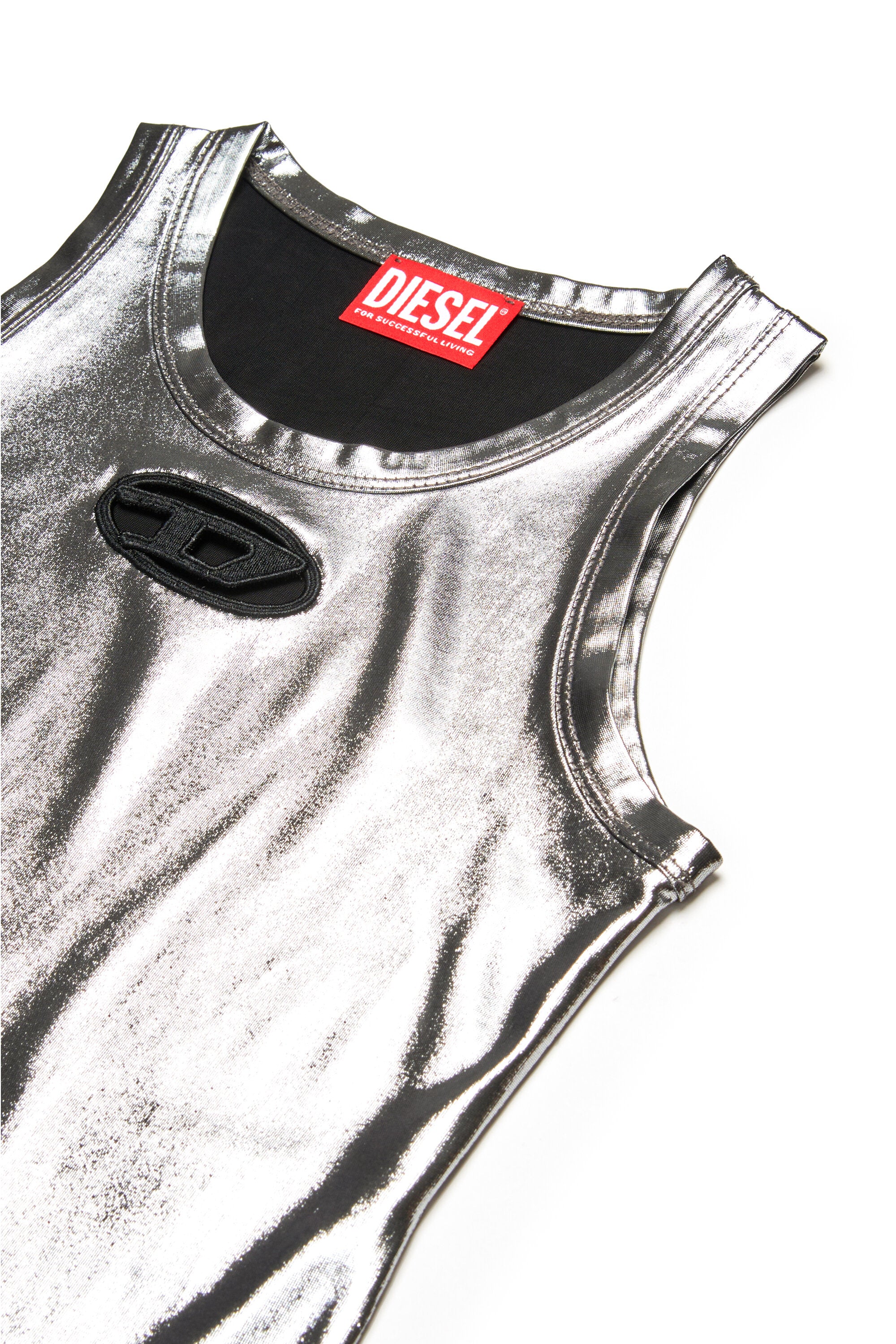 Sleeveless top with metallic finish