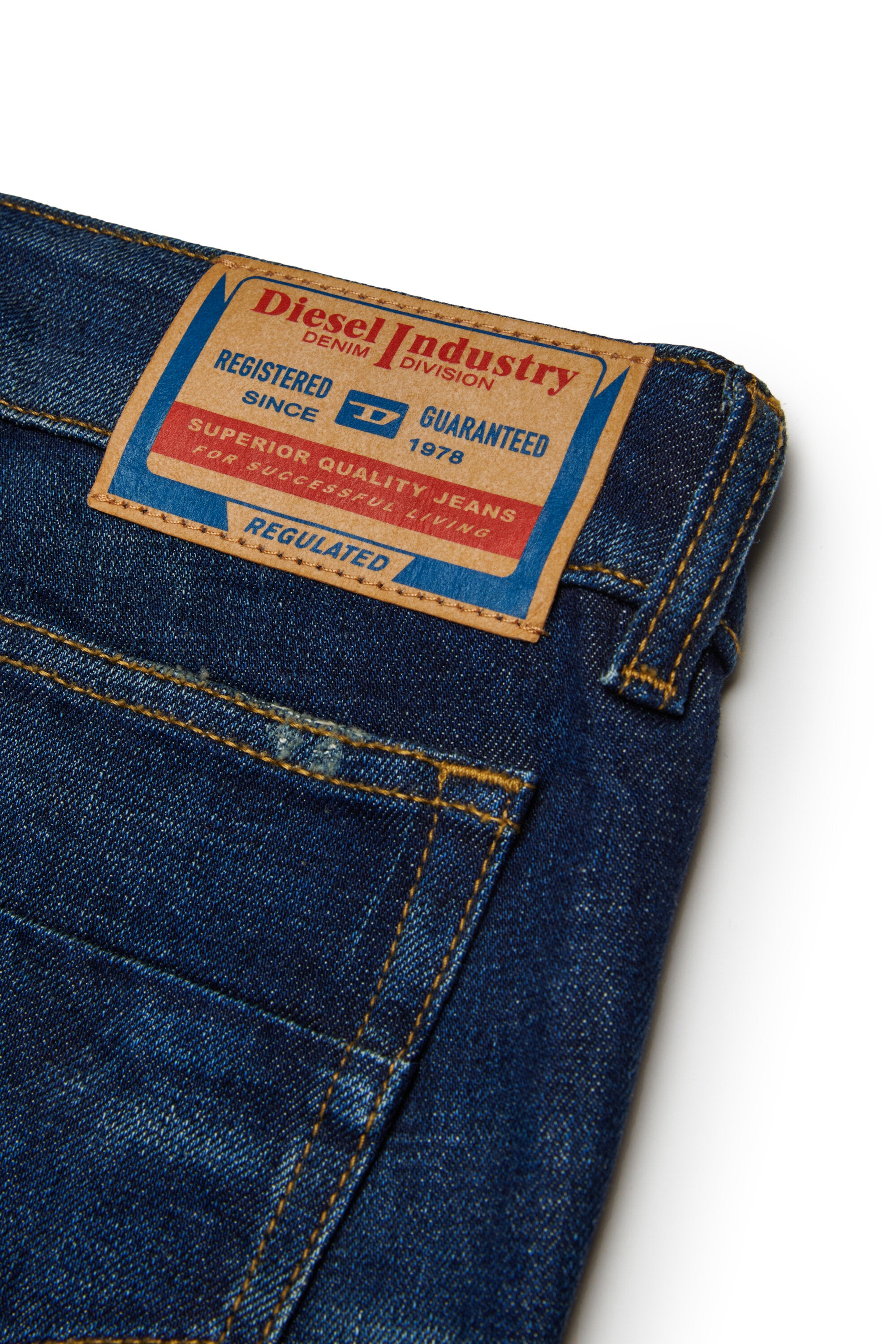 Dark blue bootcut jeans with abrasions - D-Eki