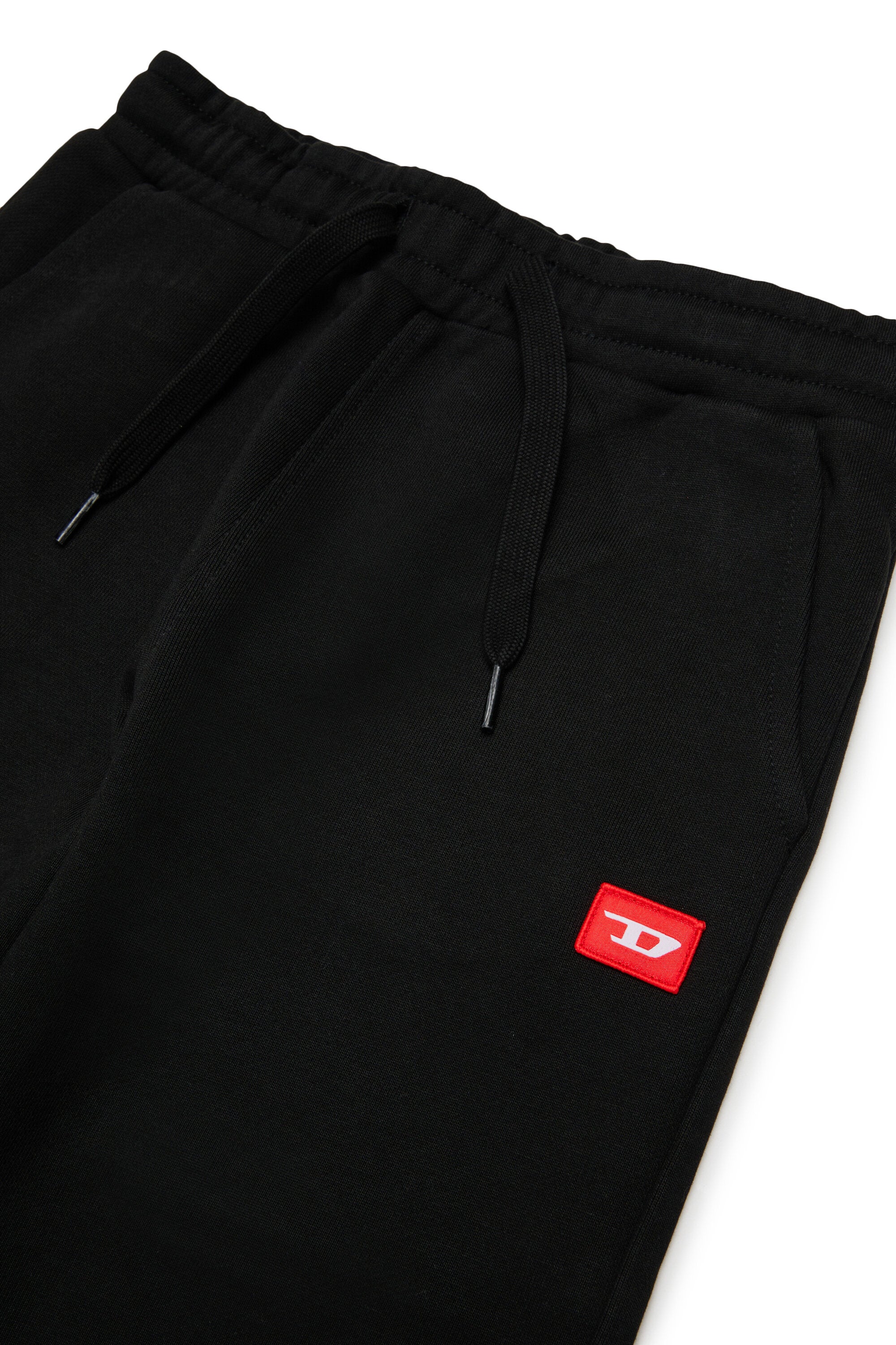 Jogger pants with red D patch