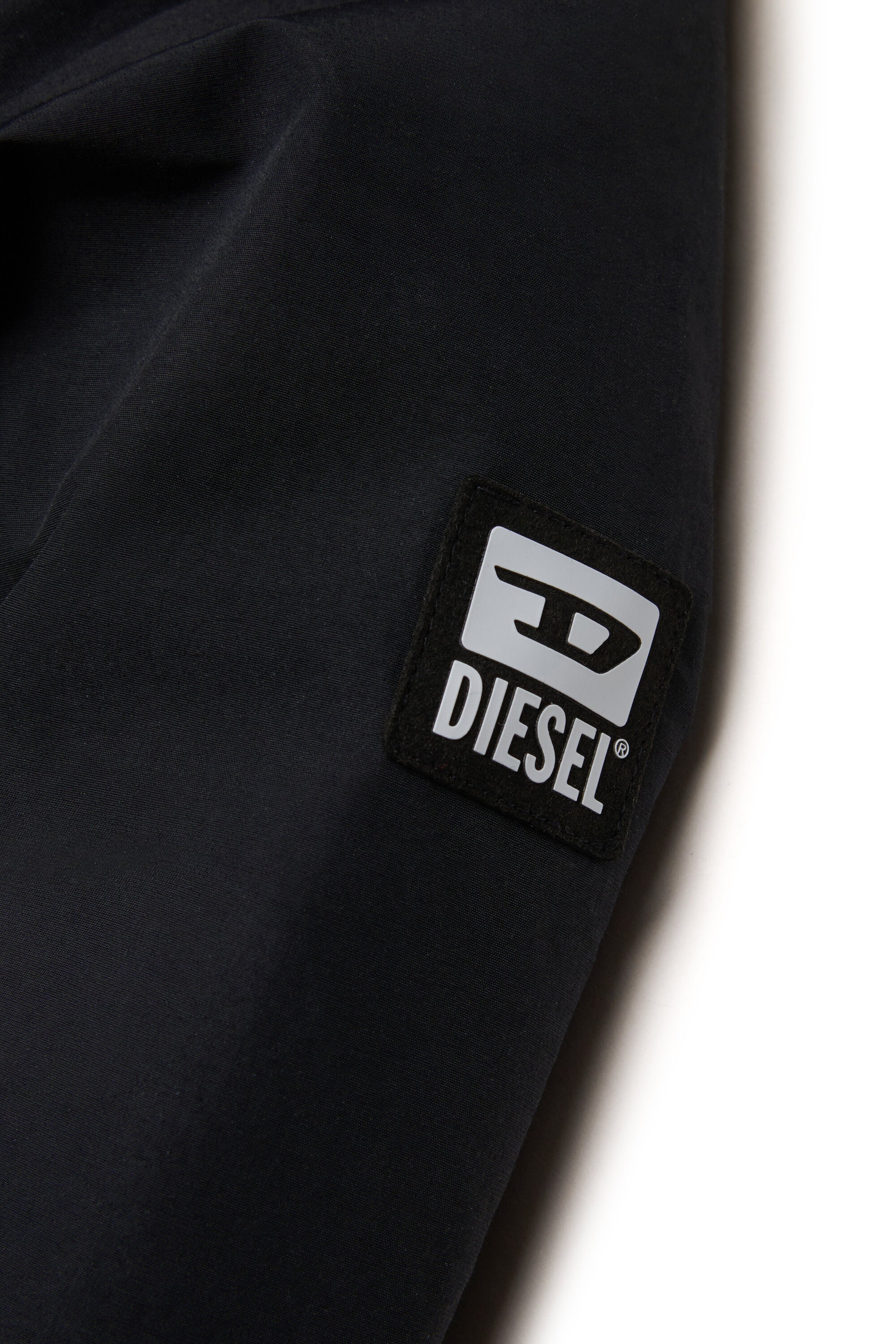 Padded jacket with faux fur hood and pockets