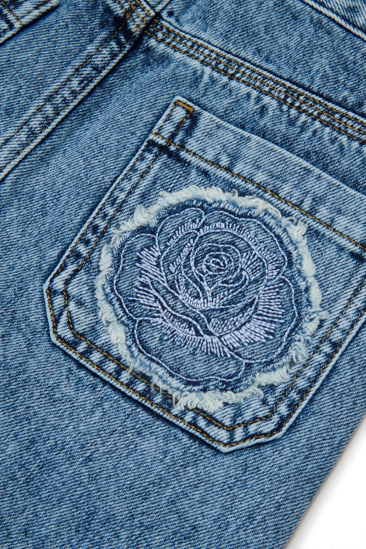 Denim skirt with back embroidery