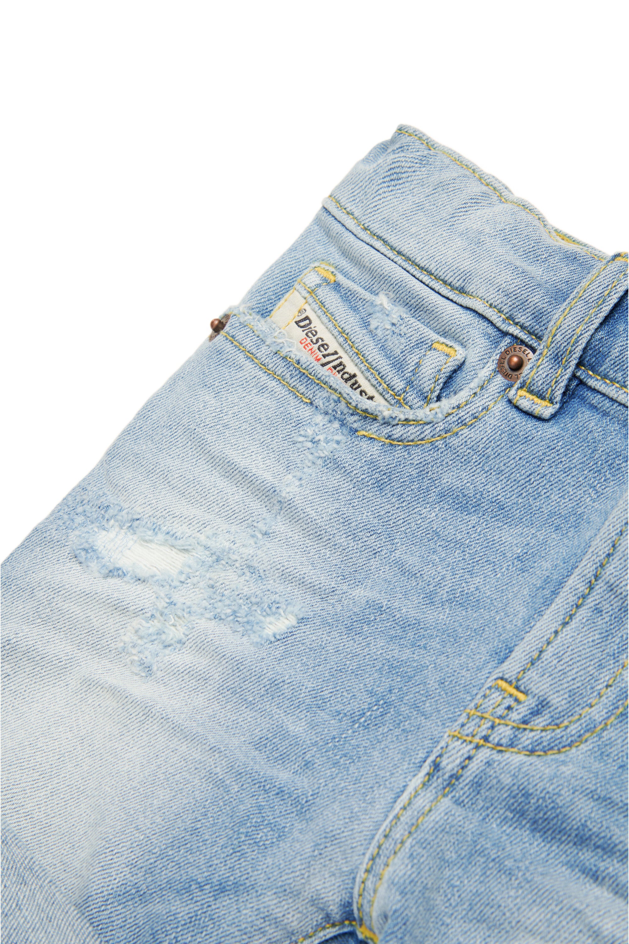 Light-coloured jeans shorts with abrasions