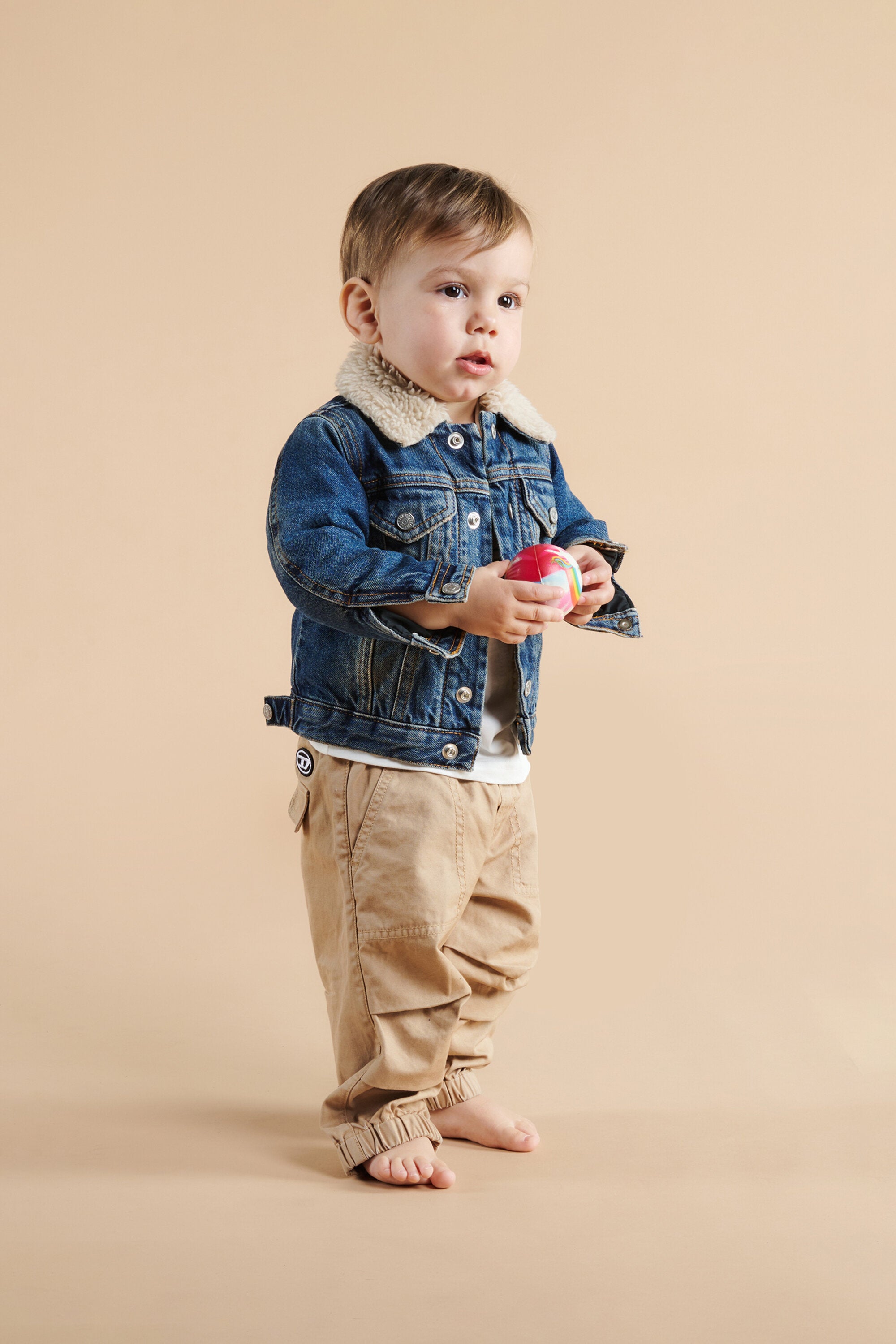 Dirty effect denim trucker jacket with teddy inner