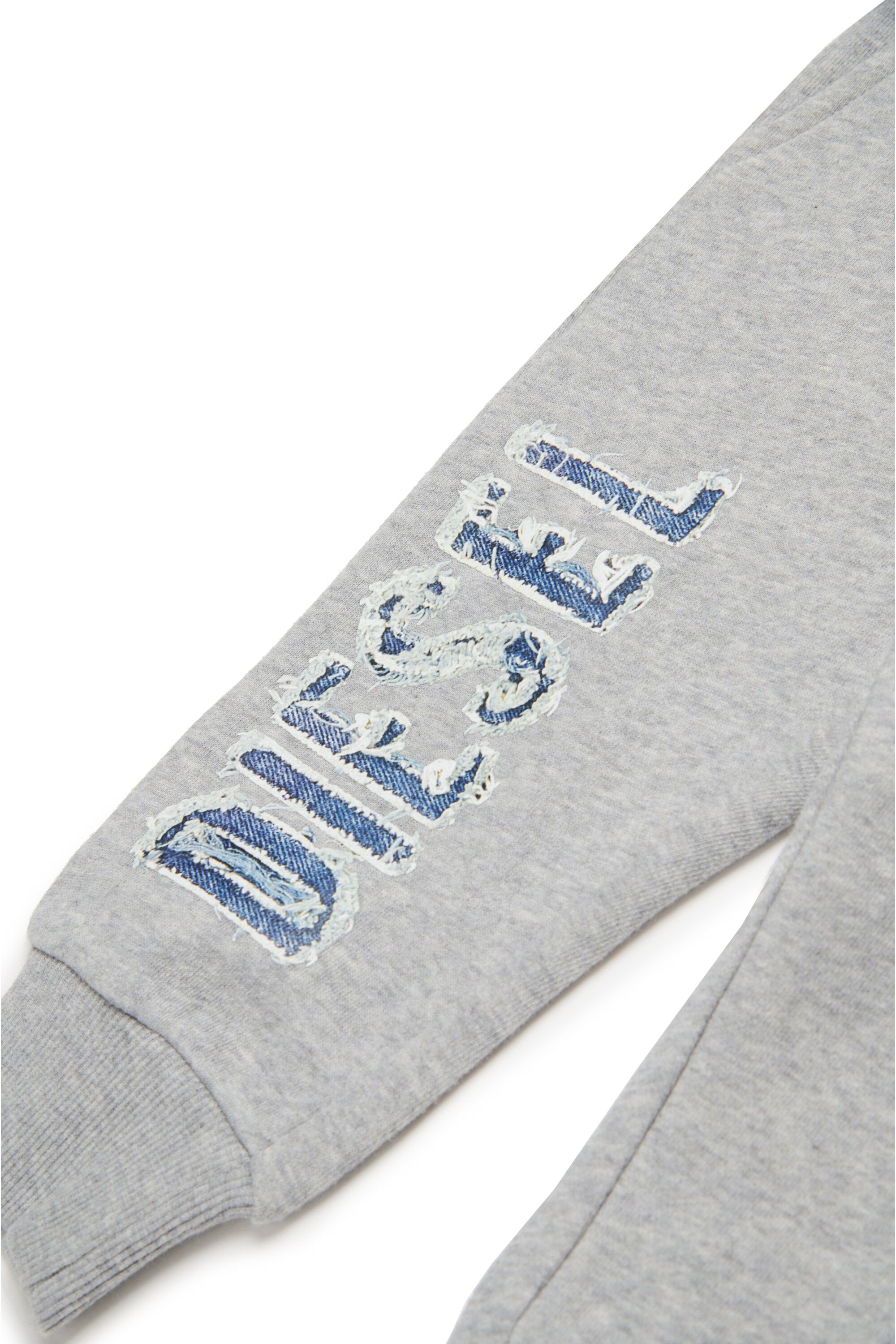 Jogger pants with Diesel denim-effect graphics