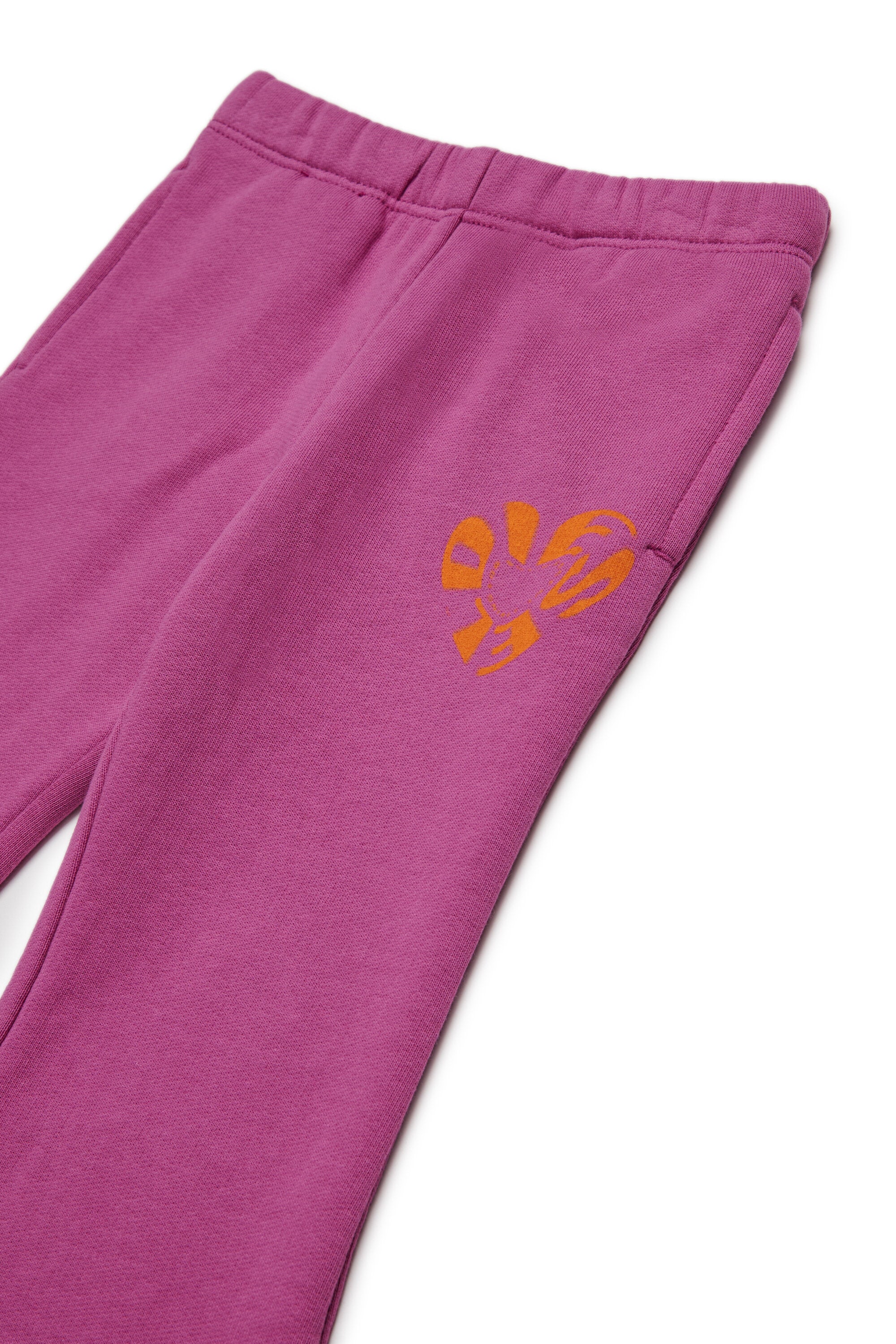 Fleece pants with Diesel Heart graphics