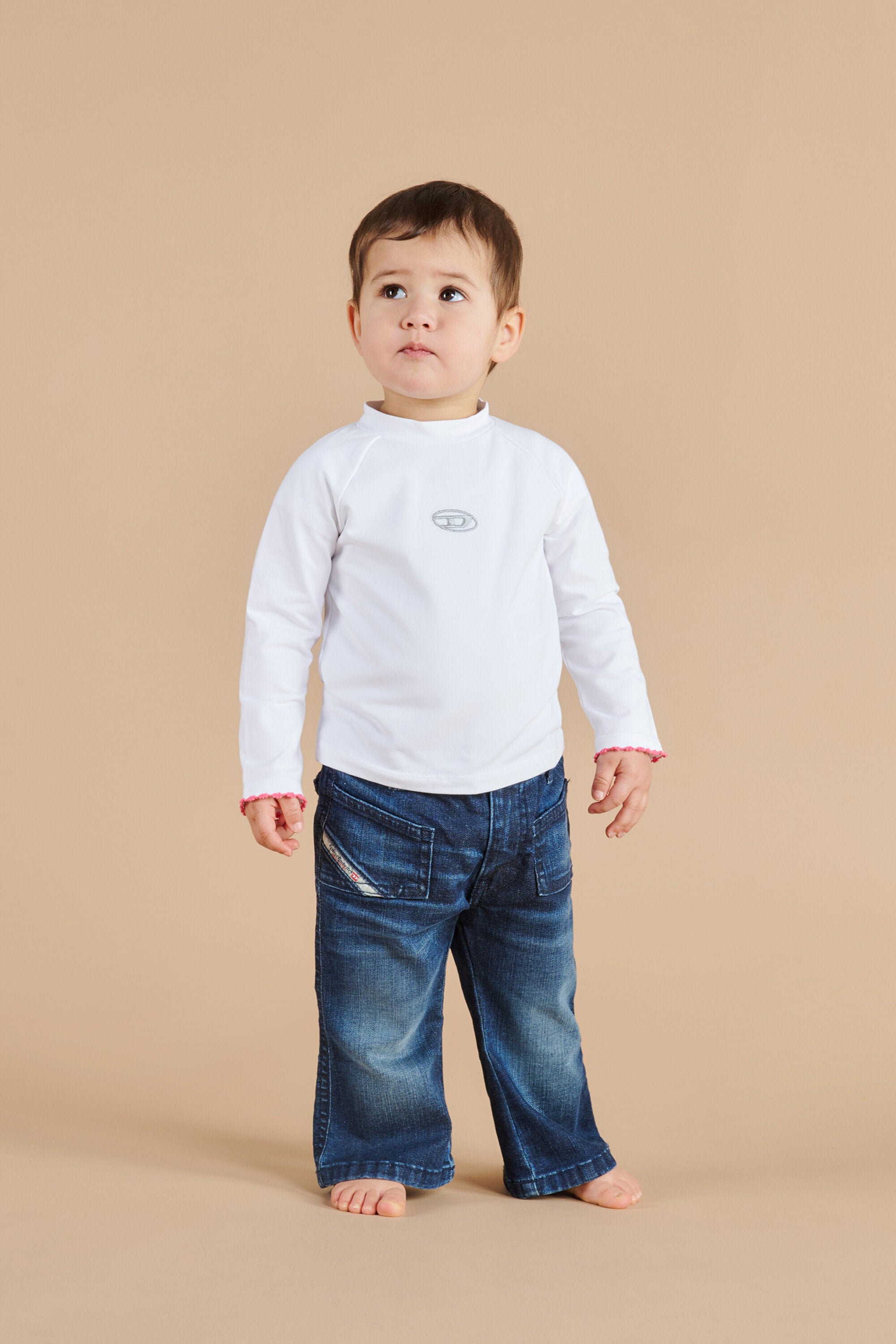 Stretch jersey turtleneck with branded Oval D lurex logo