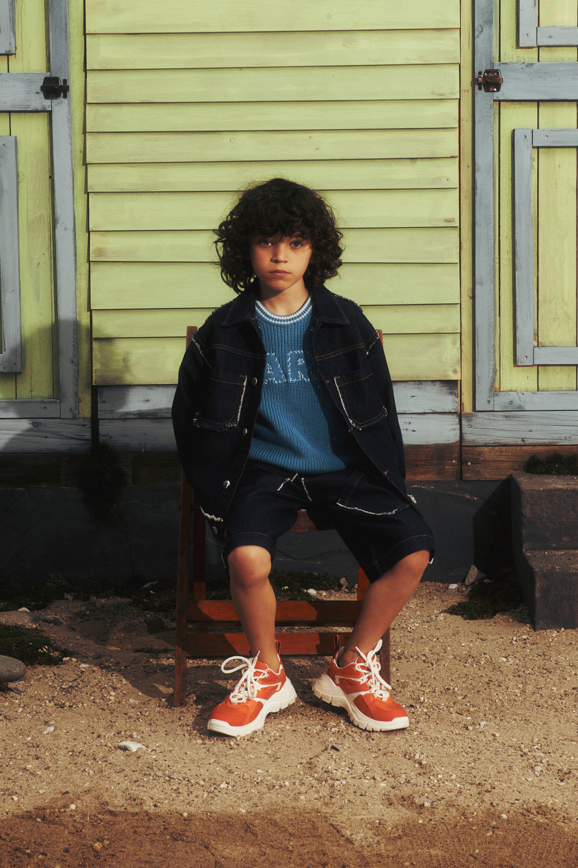 Dark denim jacket with frayed details