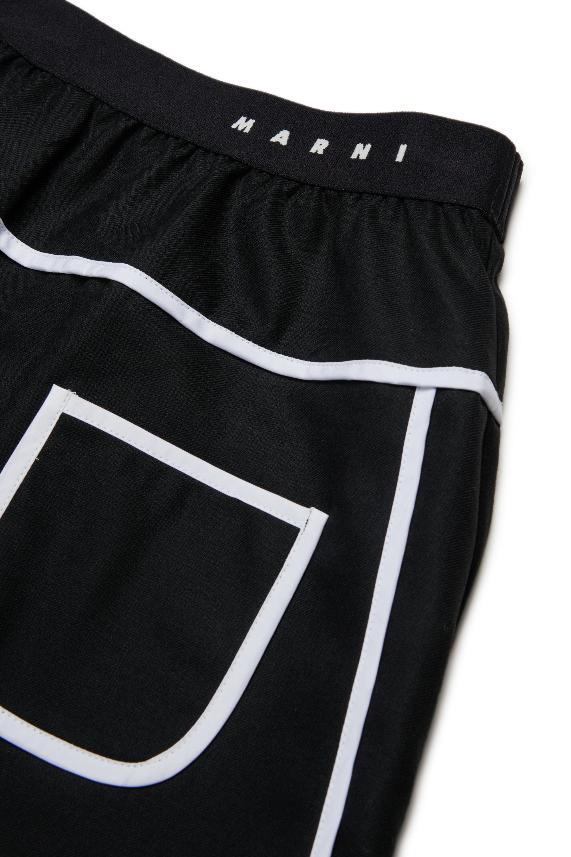 Short flannel skirt with contrasting piping