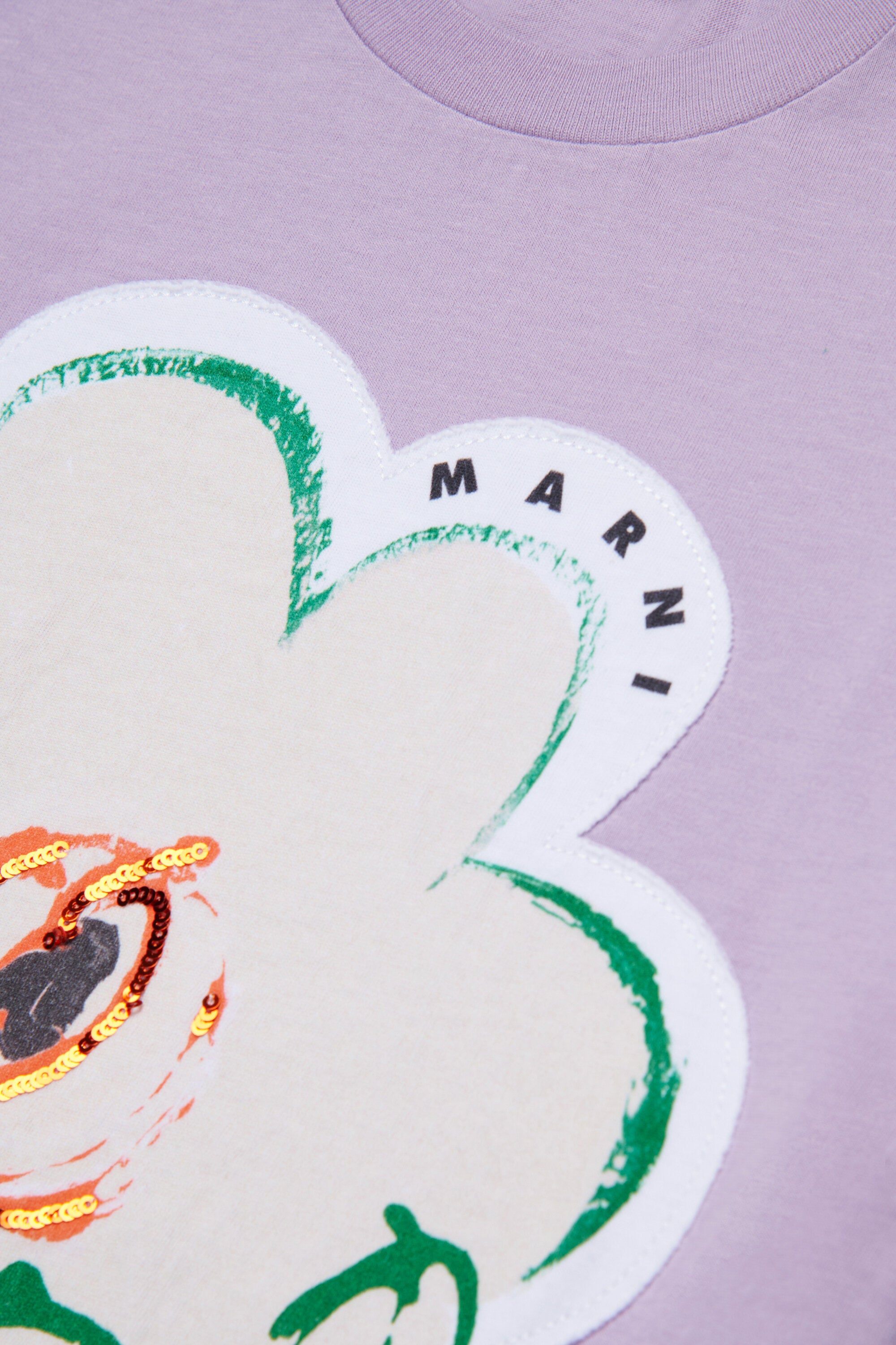 T-shirt with appliqué flower and logo