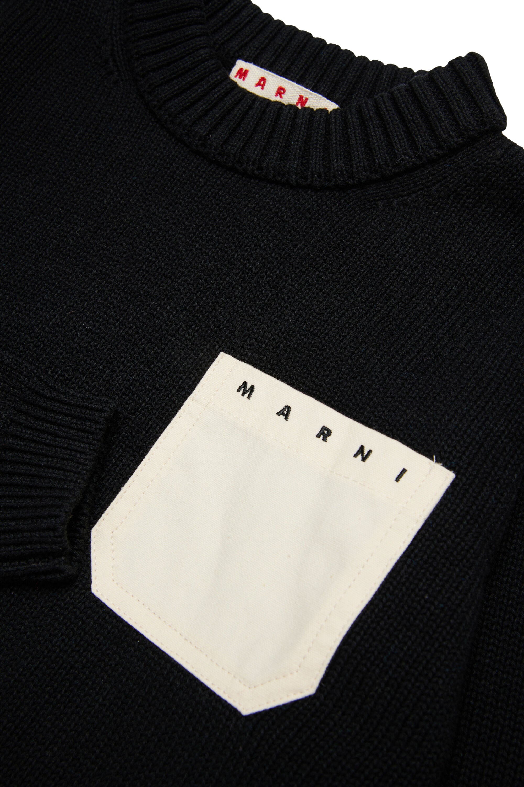 Crew neck pullover with chest pocket and logo