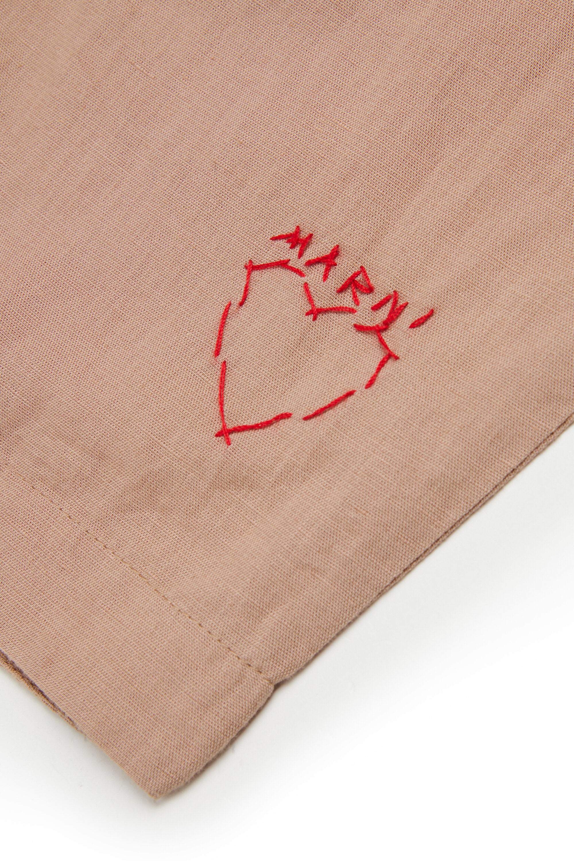 Pants with embroidered logo