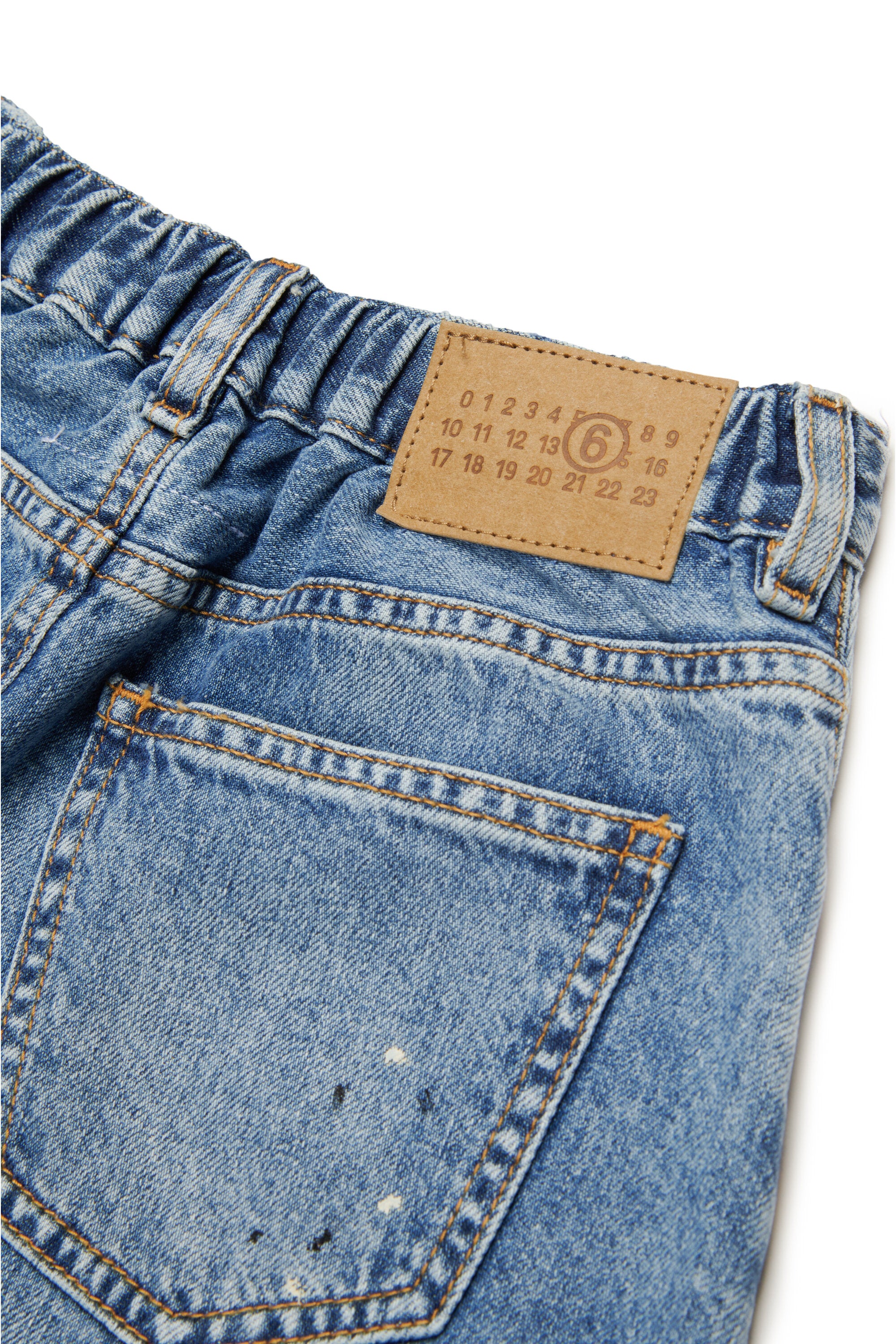 Blue shaded denim skirt with color spots