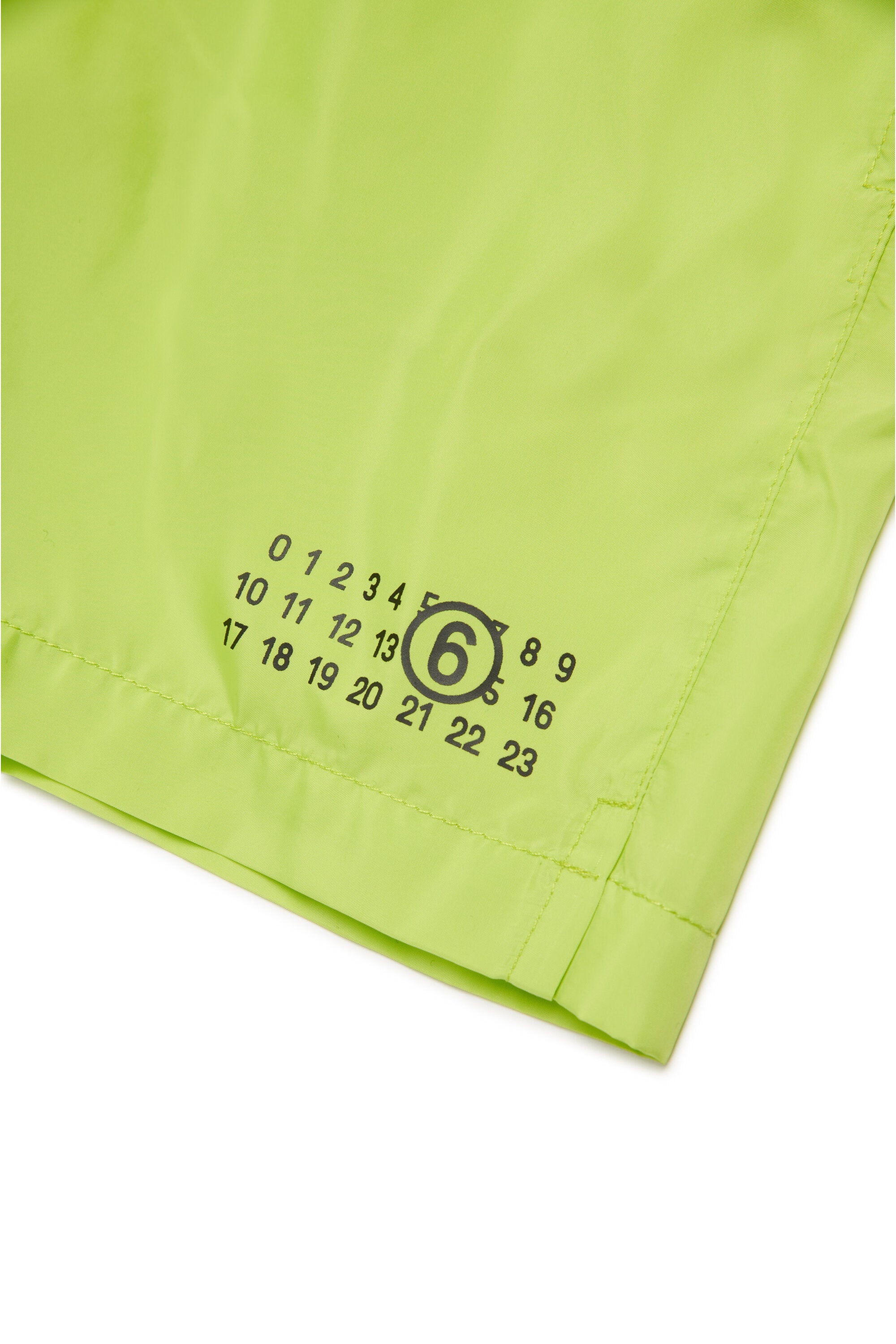 Boxer swimsuit branded with Numeric logo