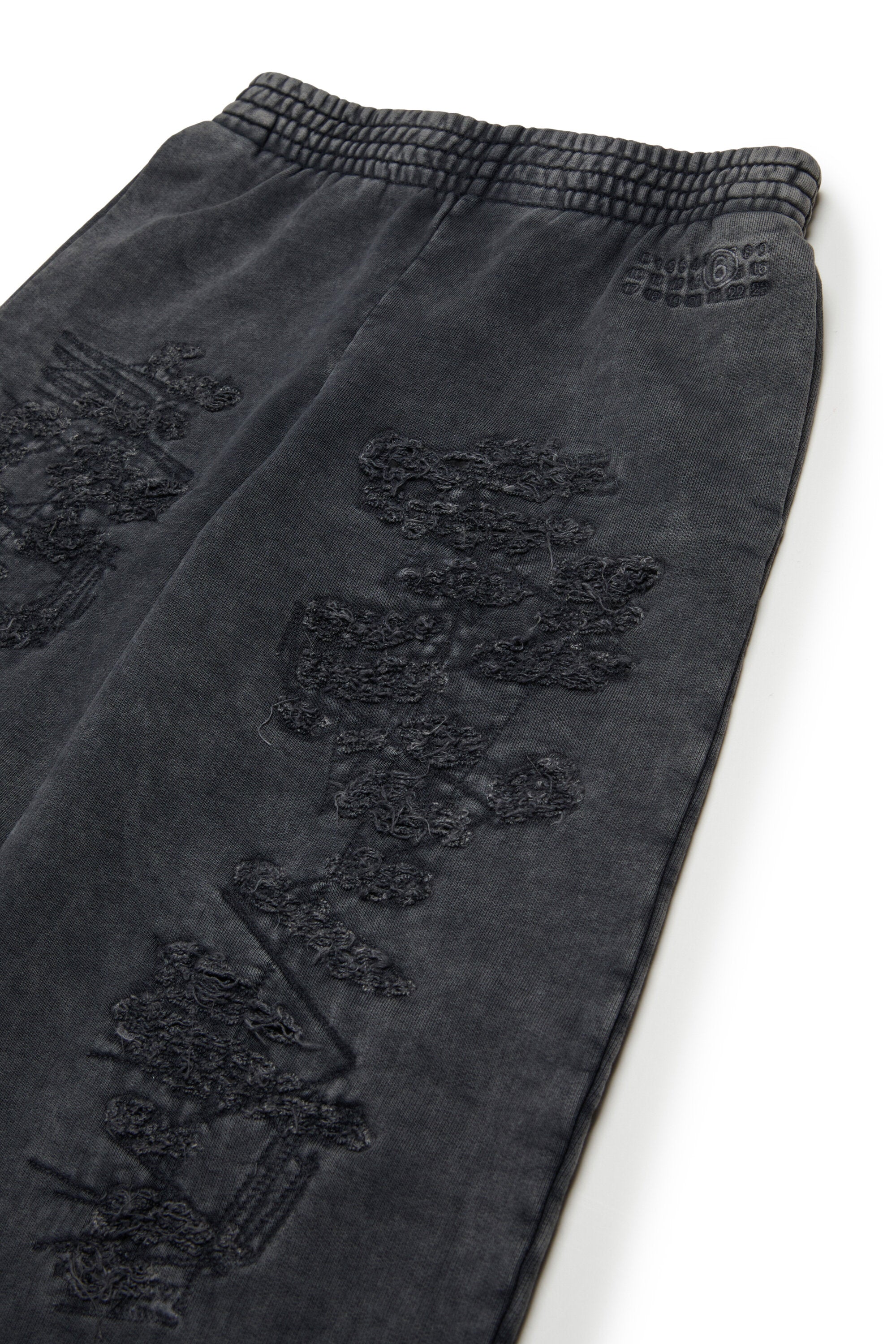 Fleece pants with mending breaks