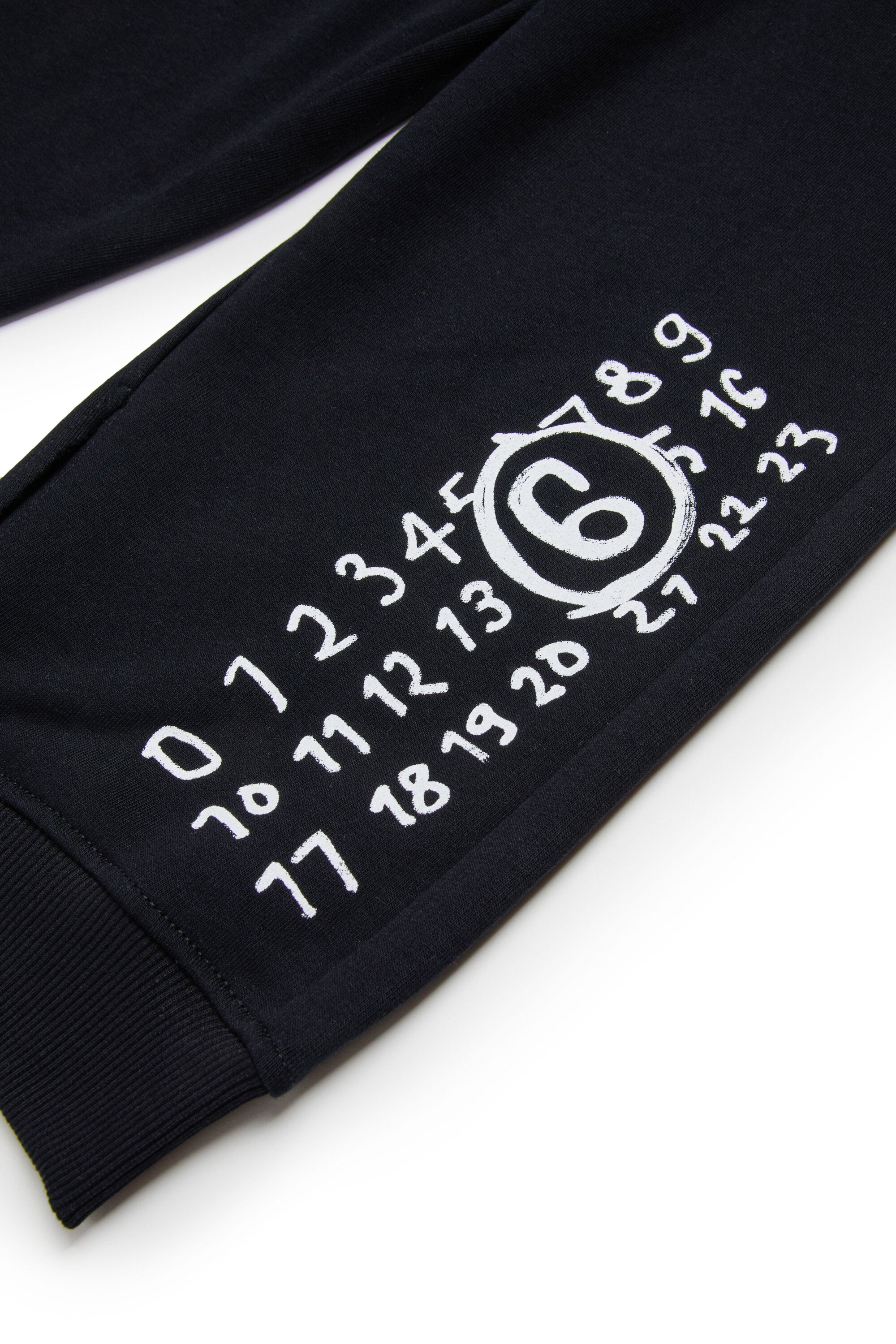 Split jogger pants branded with Hand Written logo