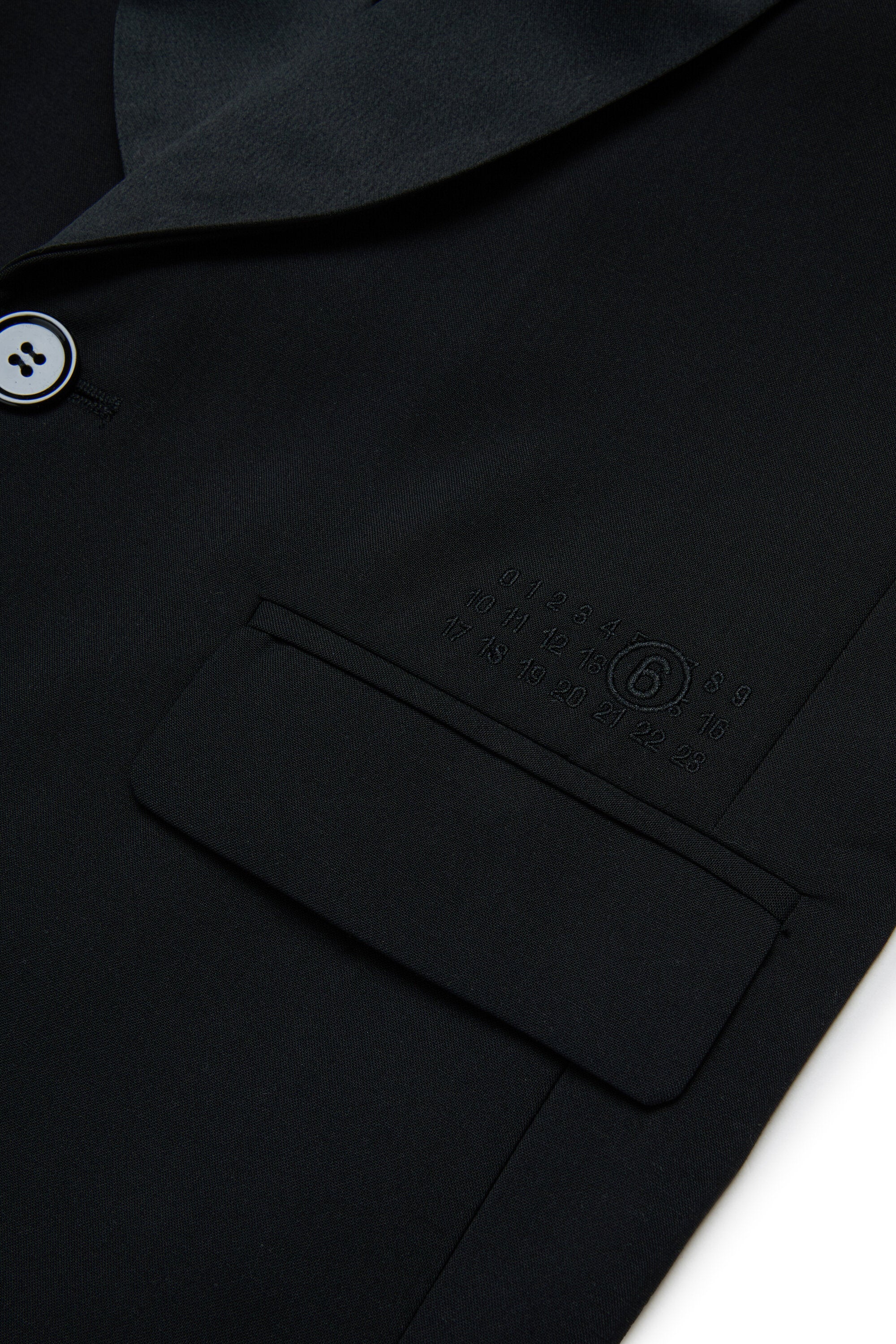 Sleeveless jacket with logo