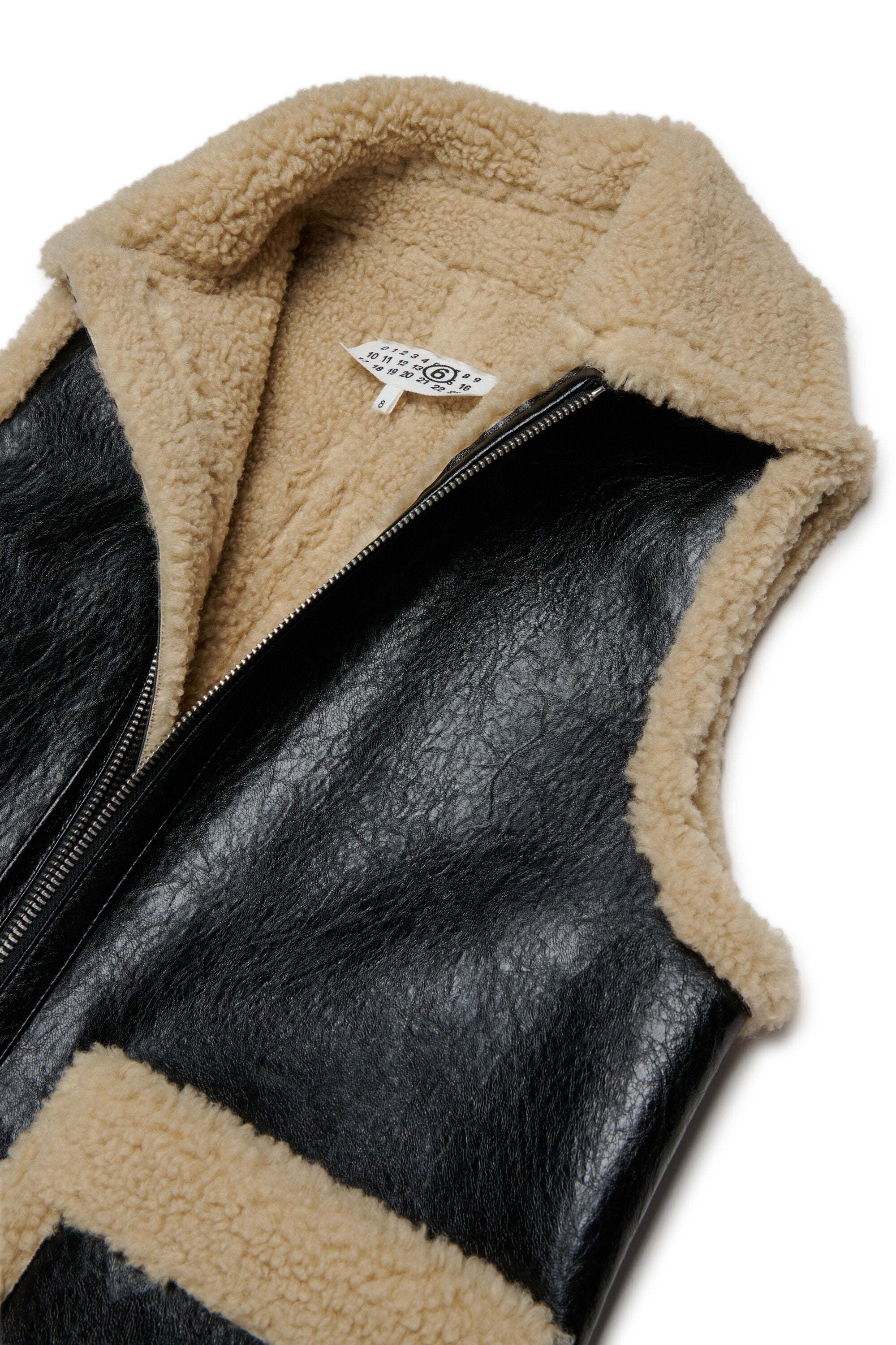 Sleeveless shearling-effect jacket