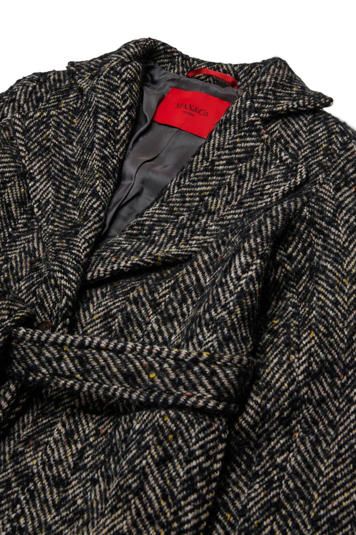 Coat with herringbone pattern