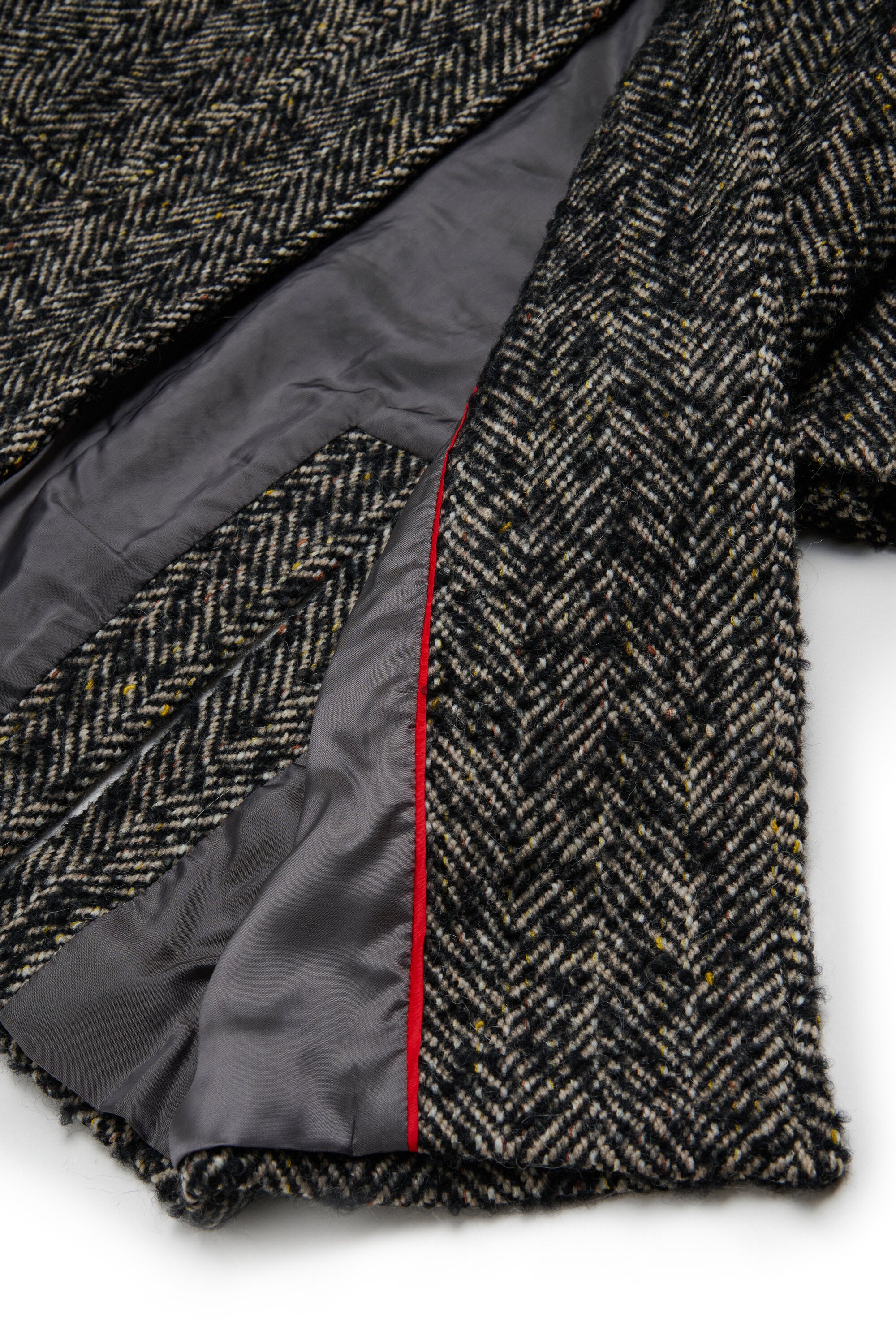 Coat with herringbone pattern