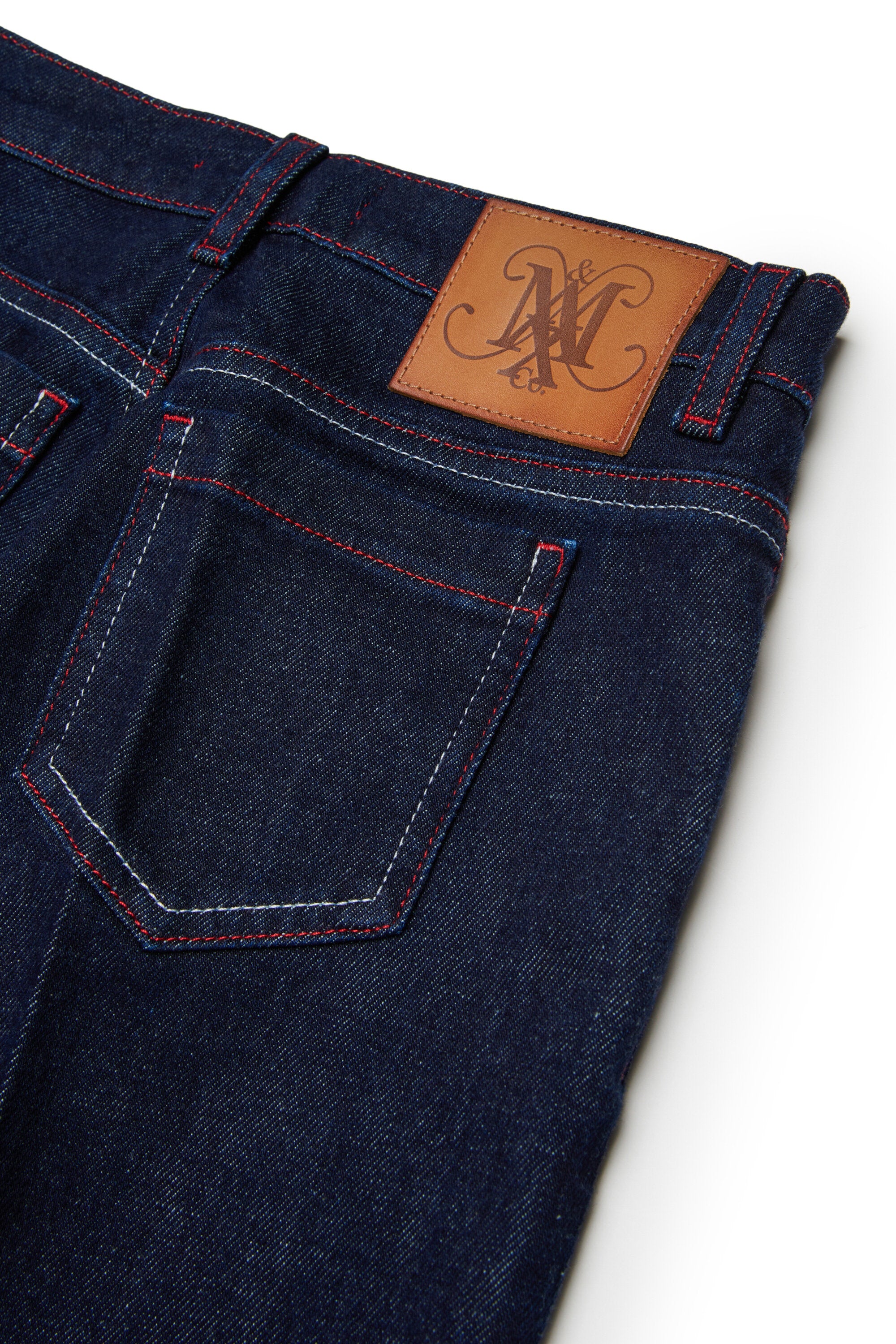 Dark blue regular jeans with crease