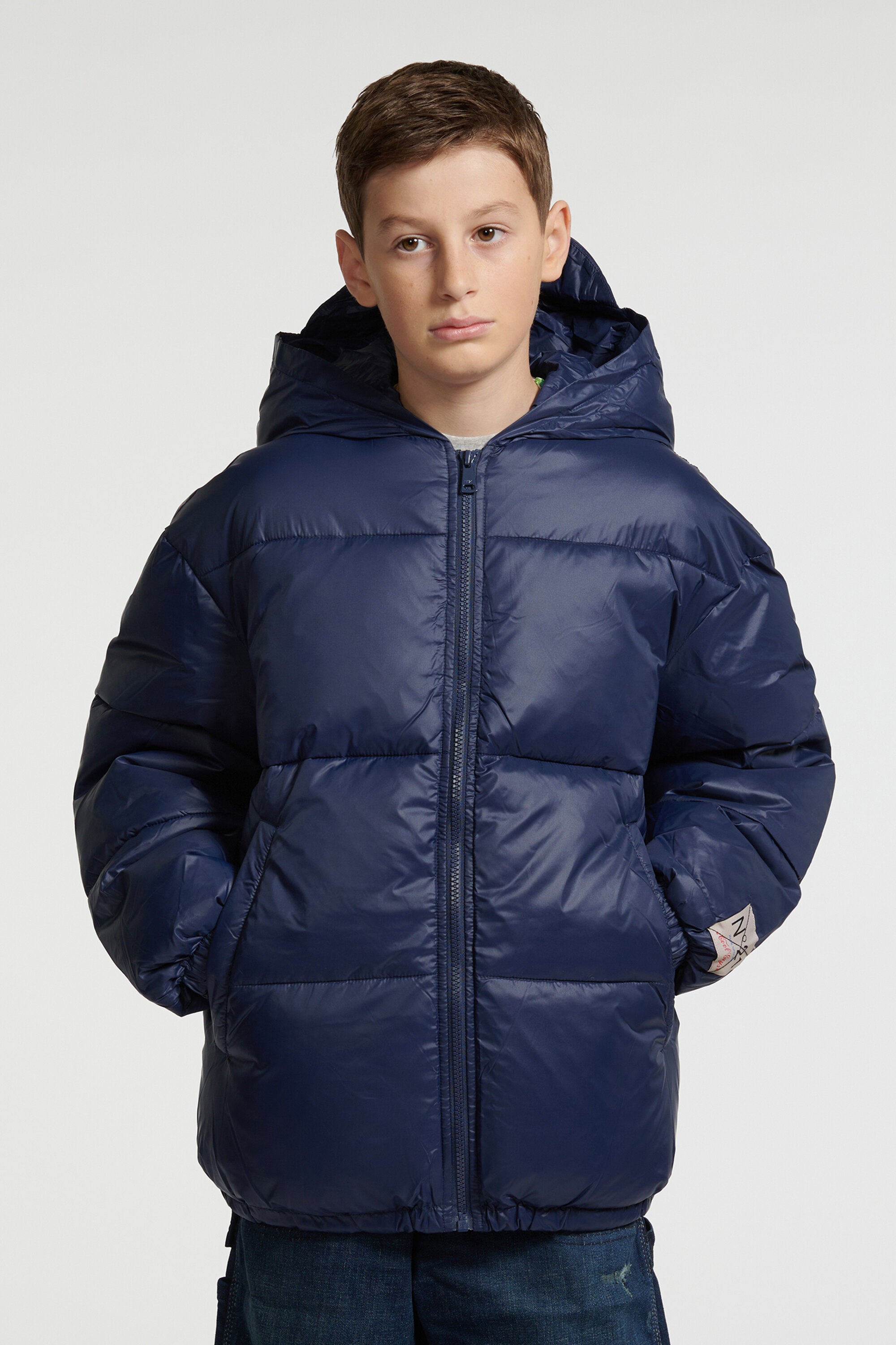 Short padded jacket with asymmetrical bottom