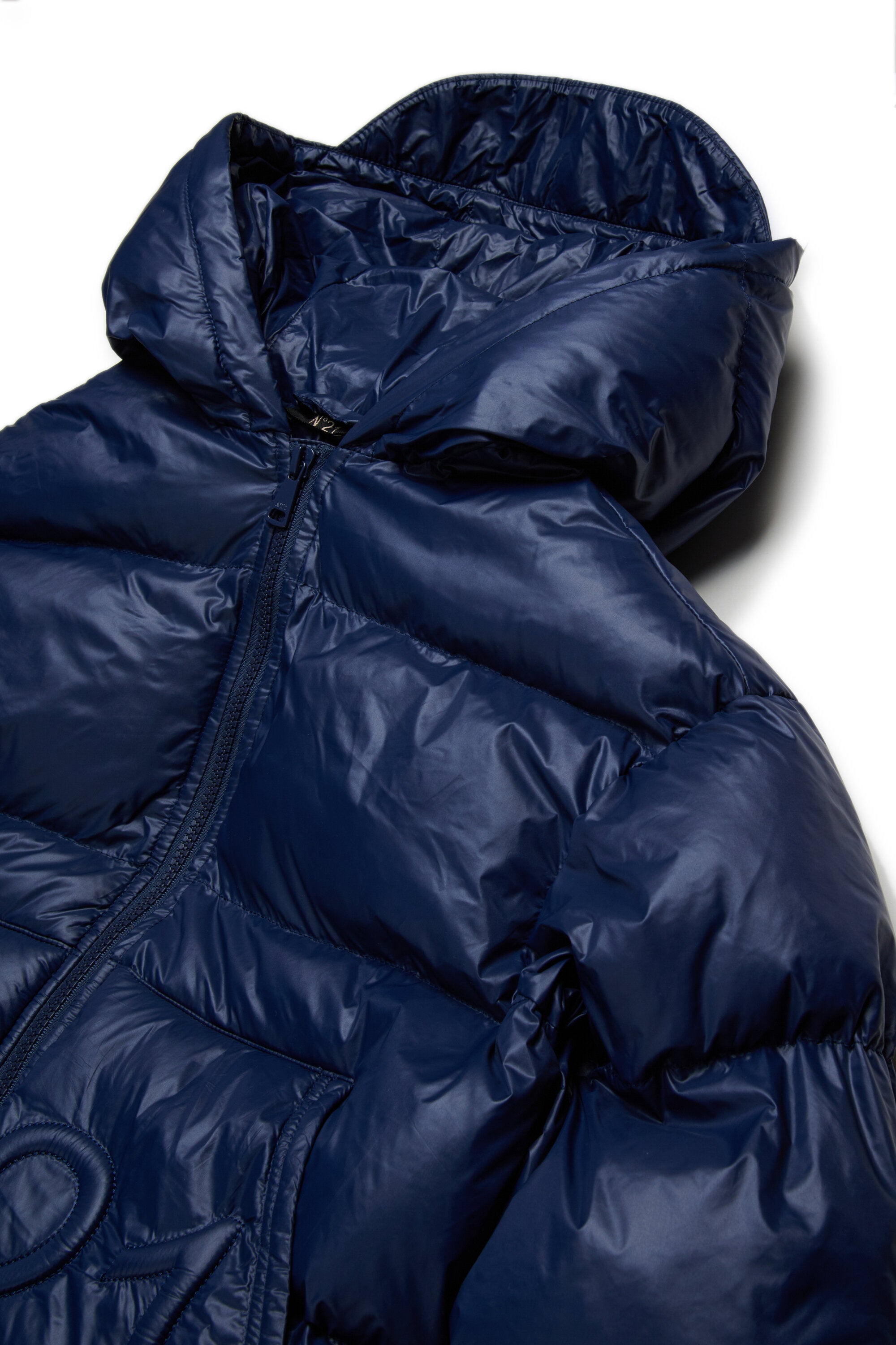 Long padded jacket with asymmetrical bottom
