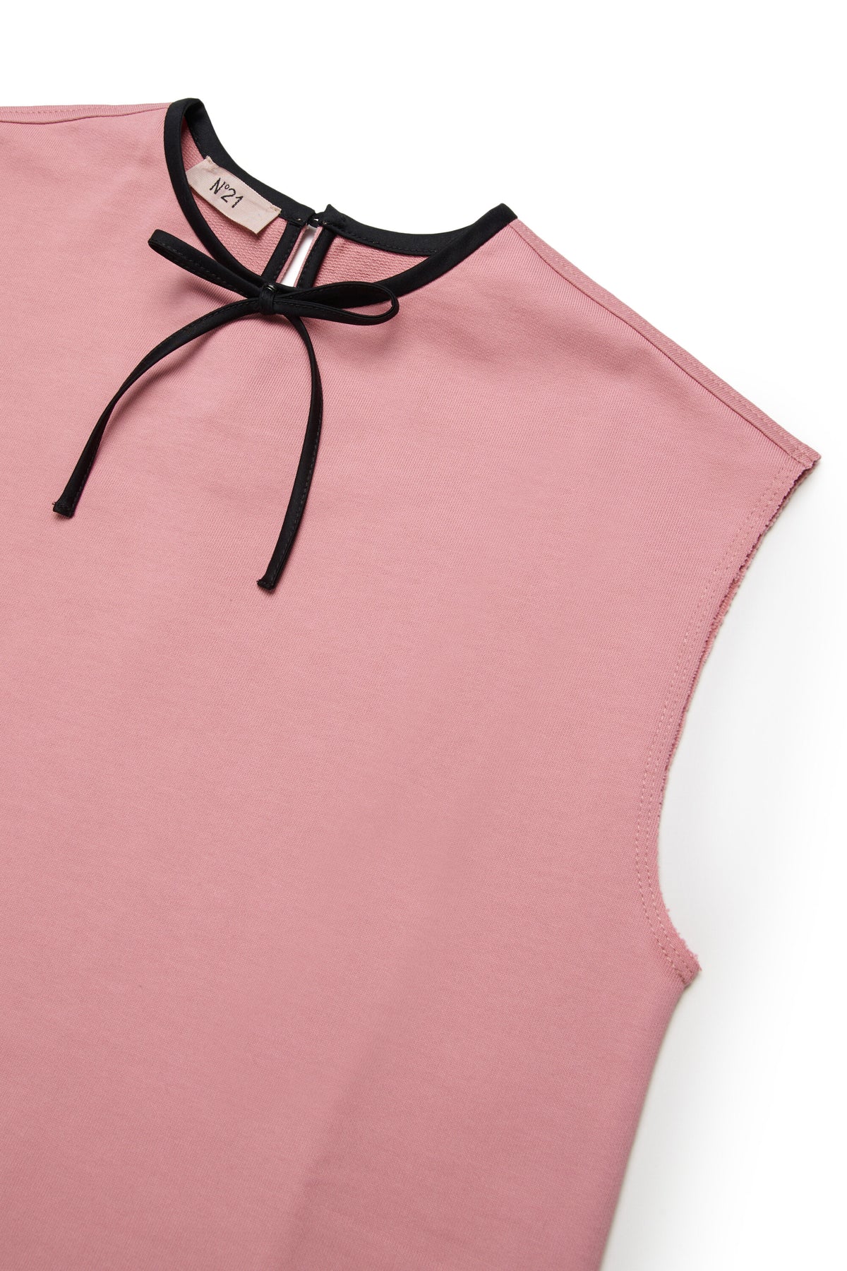 Dress with ruffle and contrasting bow