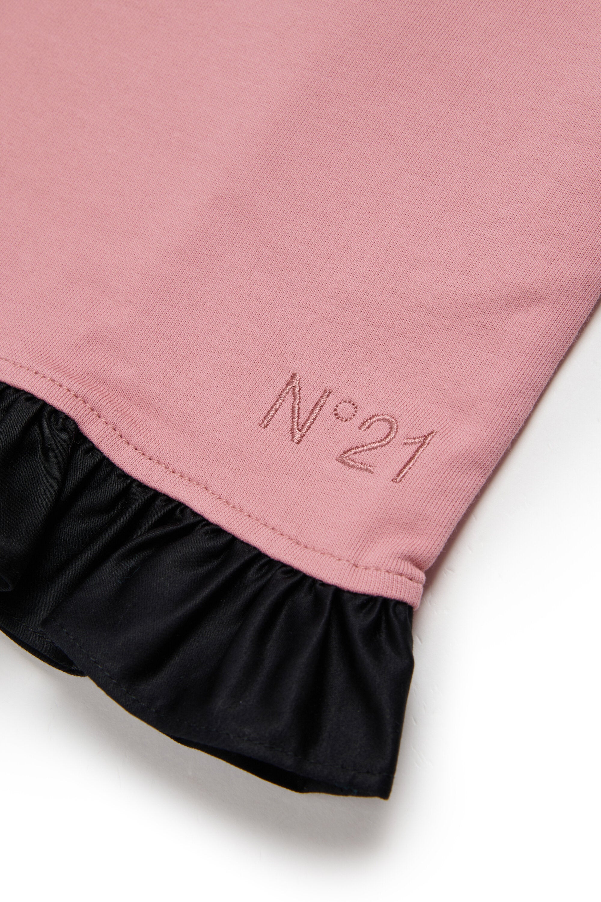 Dress with ruffle and contrasting bow