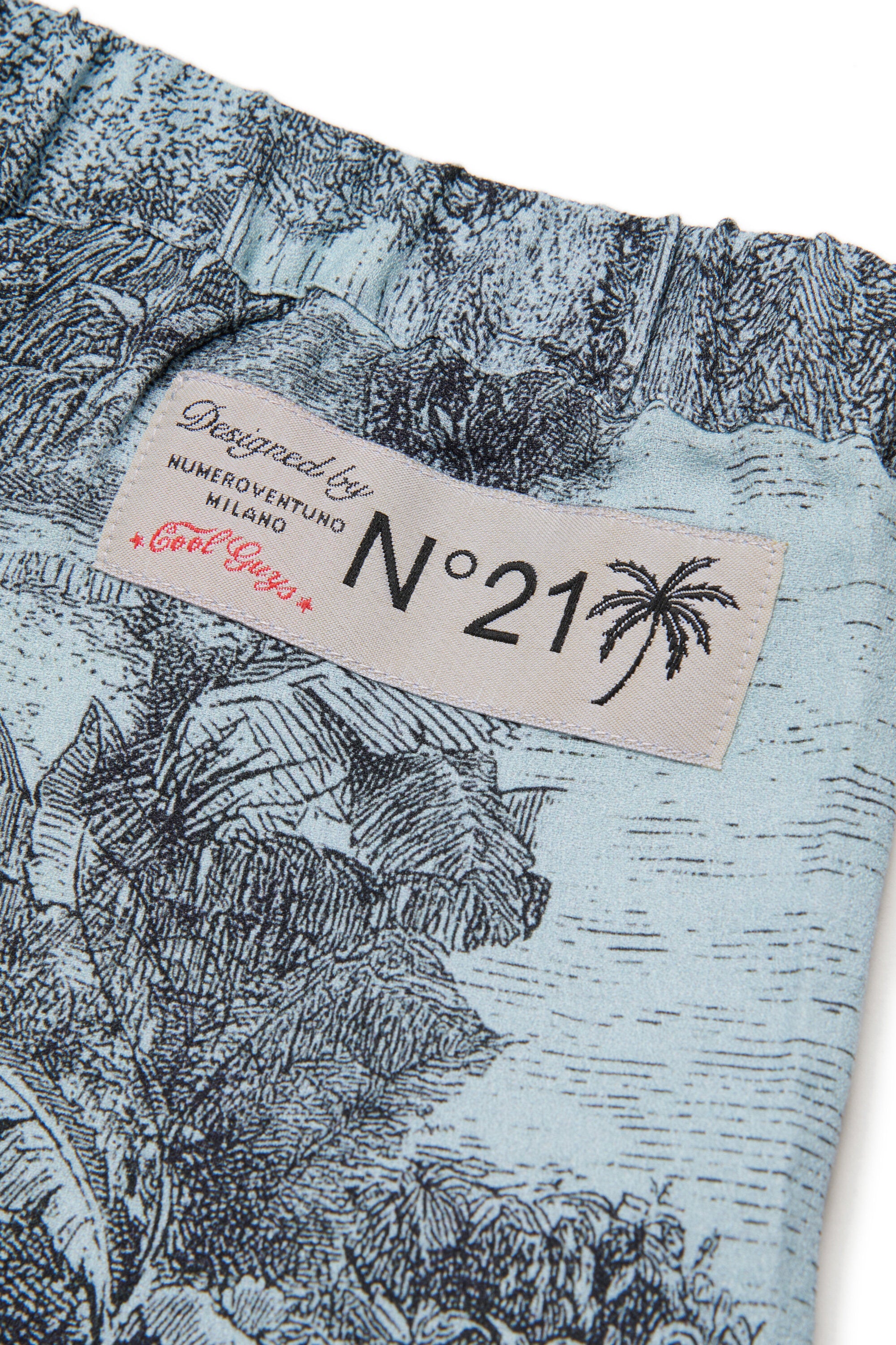 Trousers in fabric with printed pattern