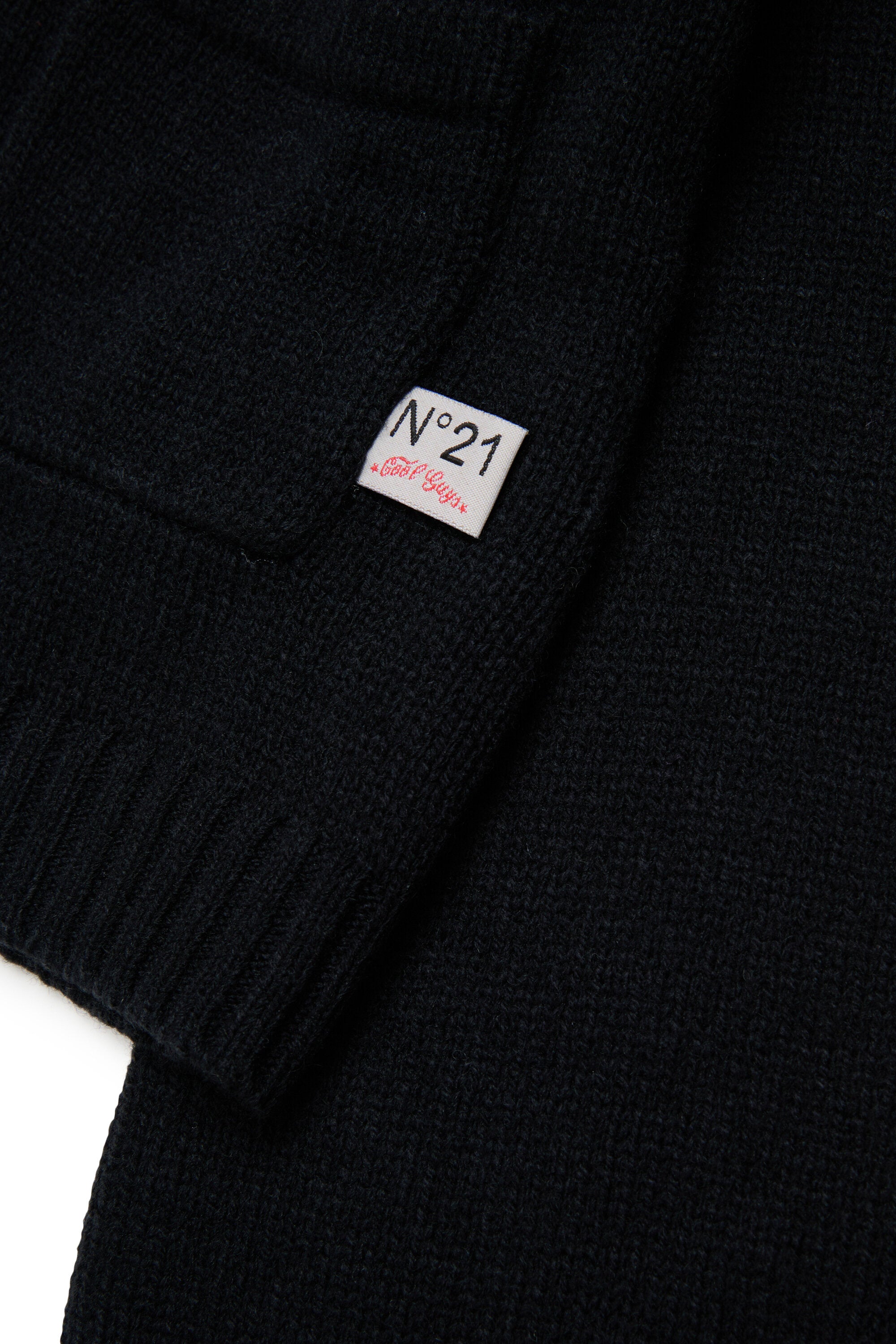Cardigan with floral embroidery on the back