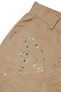 Chino pants with paint splatters