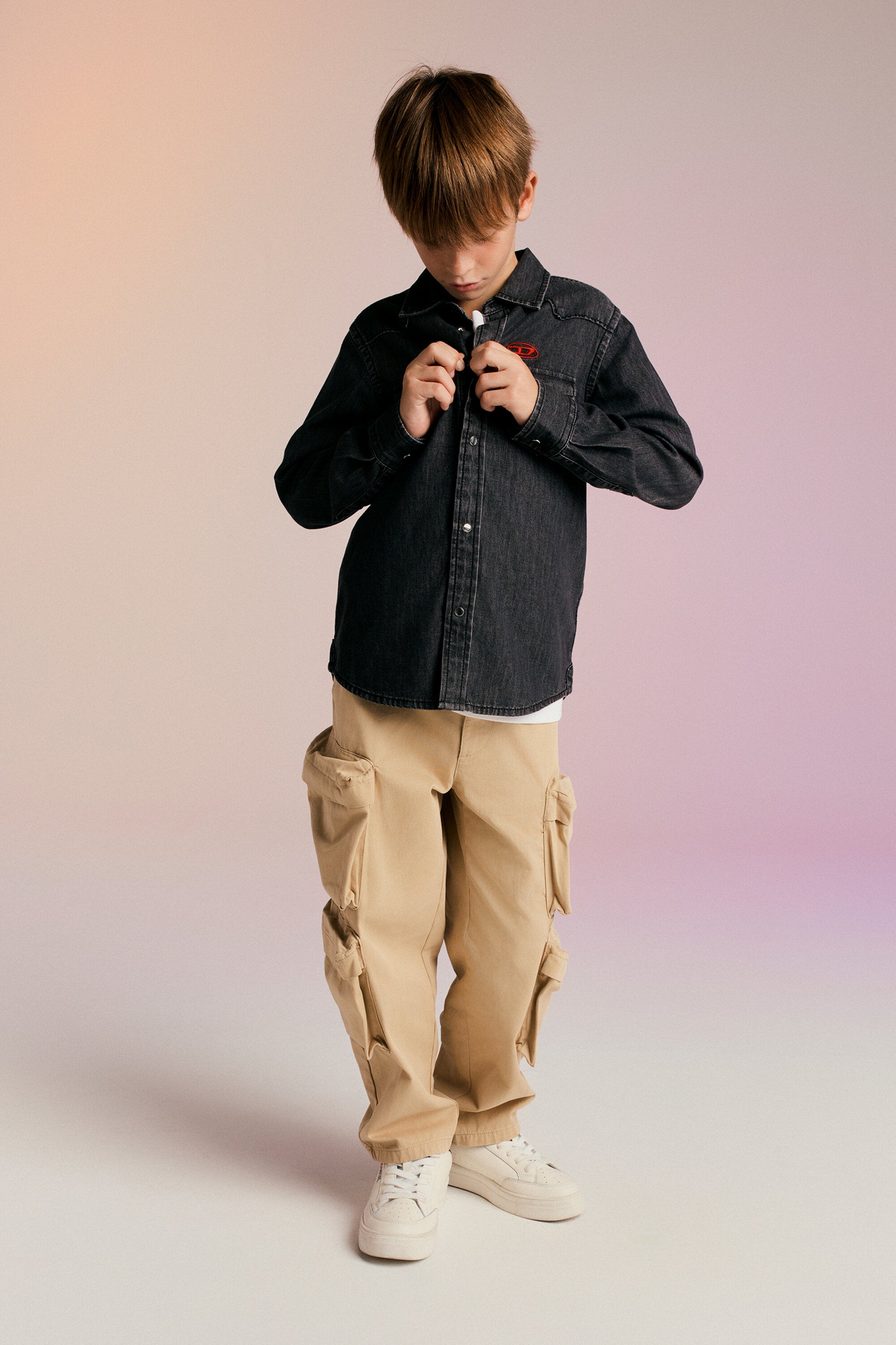 Black denim shirt branded with Oval D logo