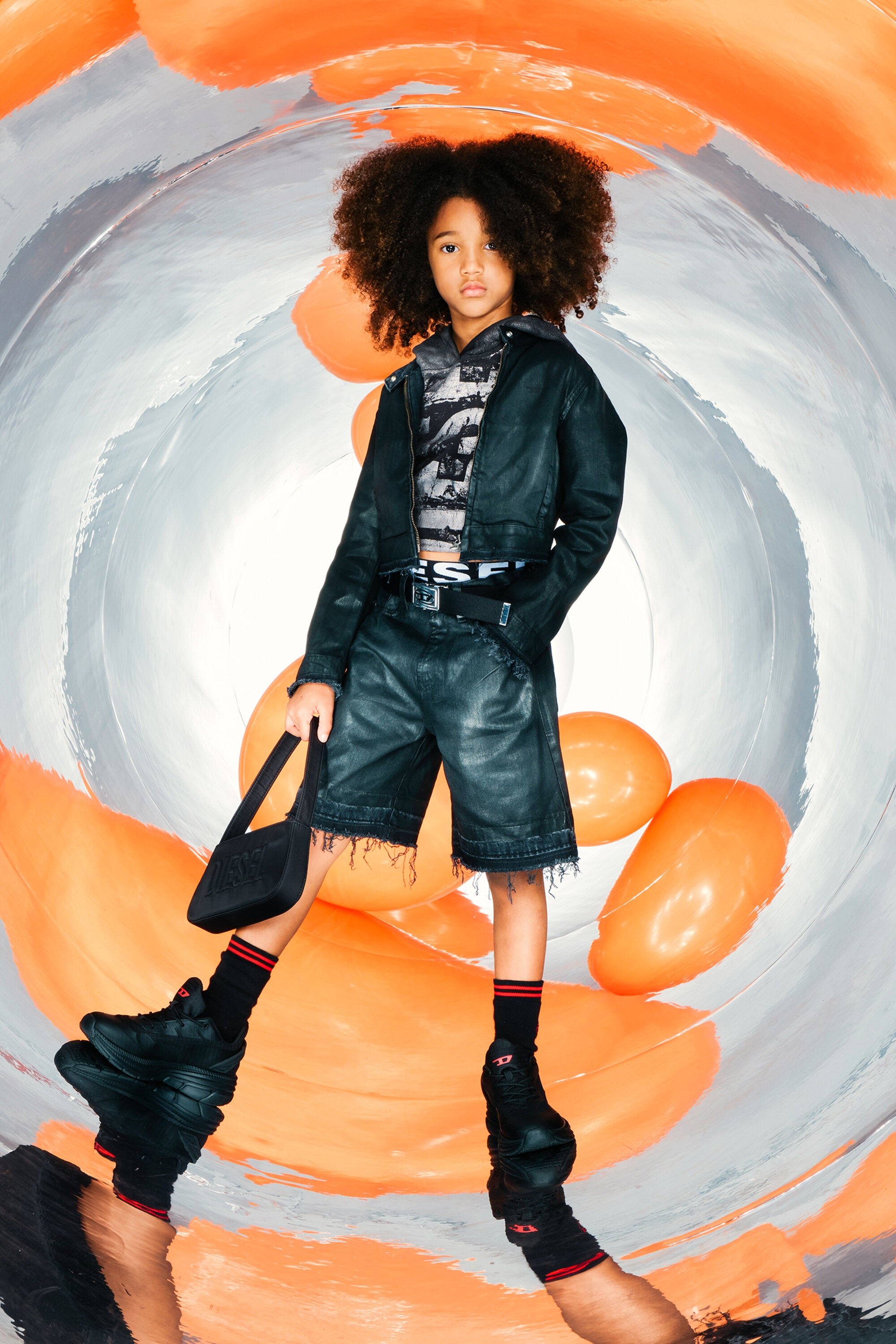 Black denim shorts with raw cut hem