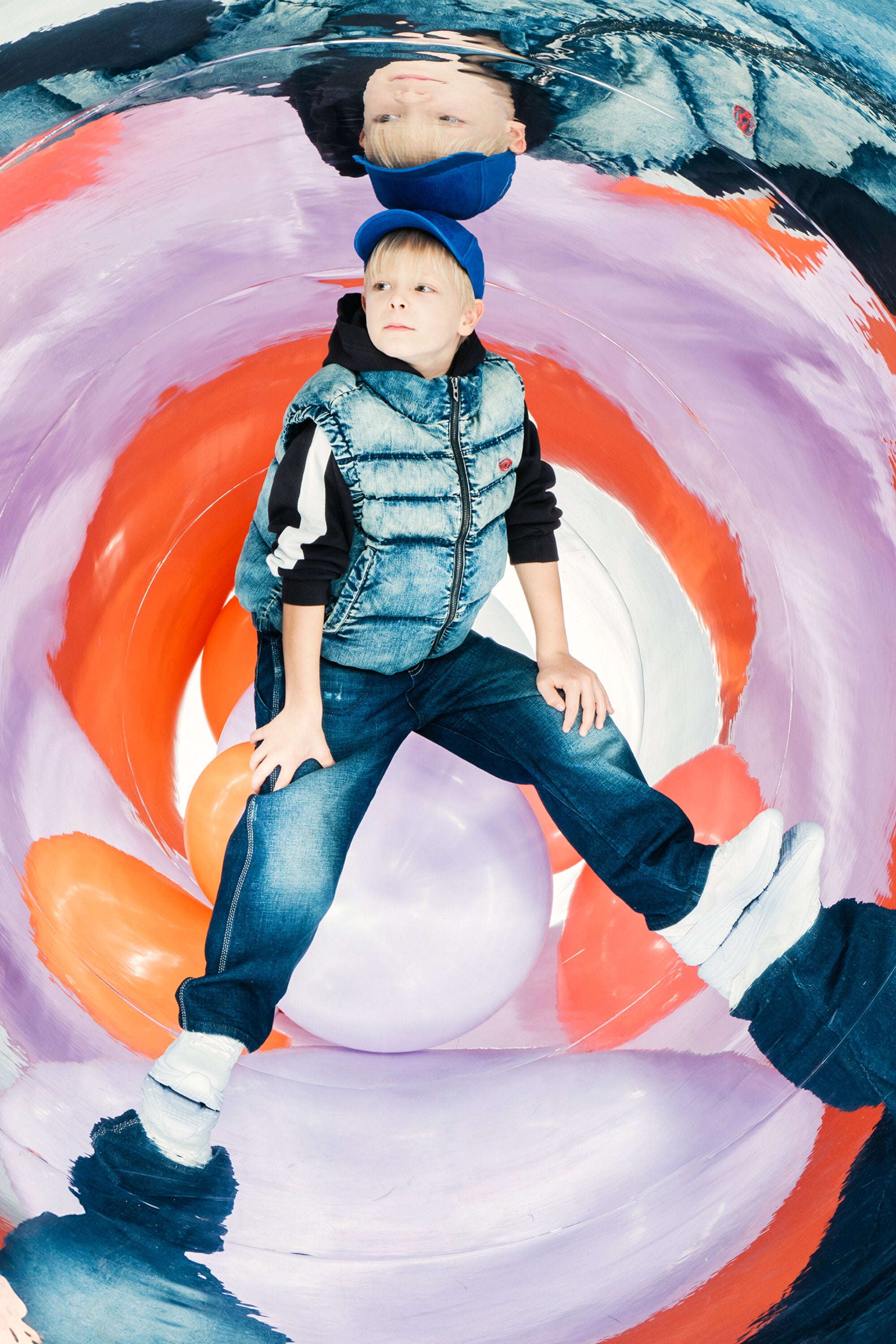 Short padded vest in dirty effect denim