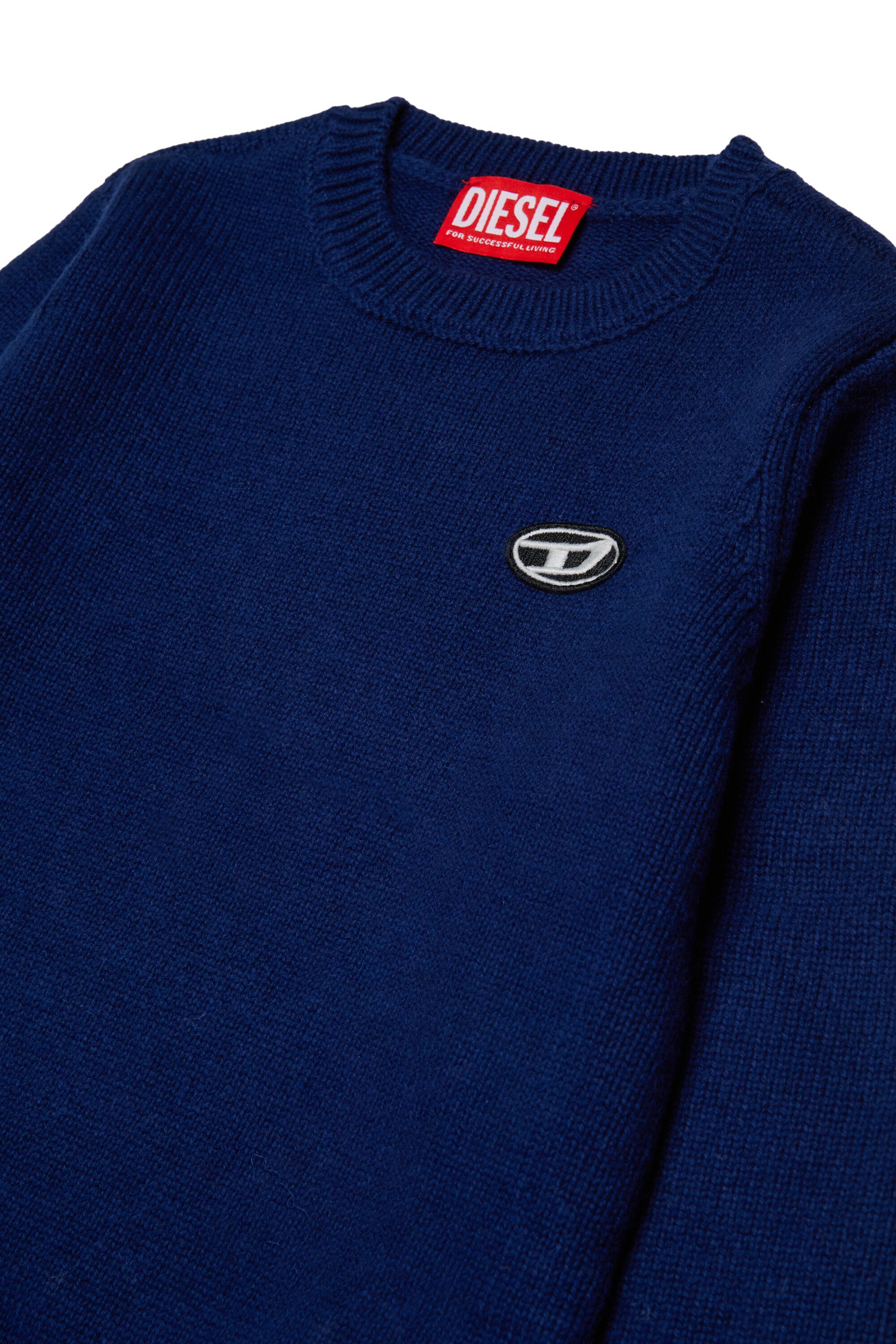 Wool and cashmere blend sweater with patches