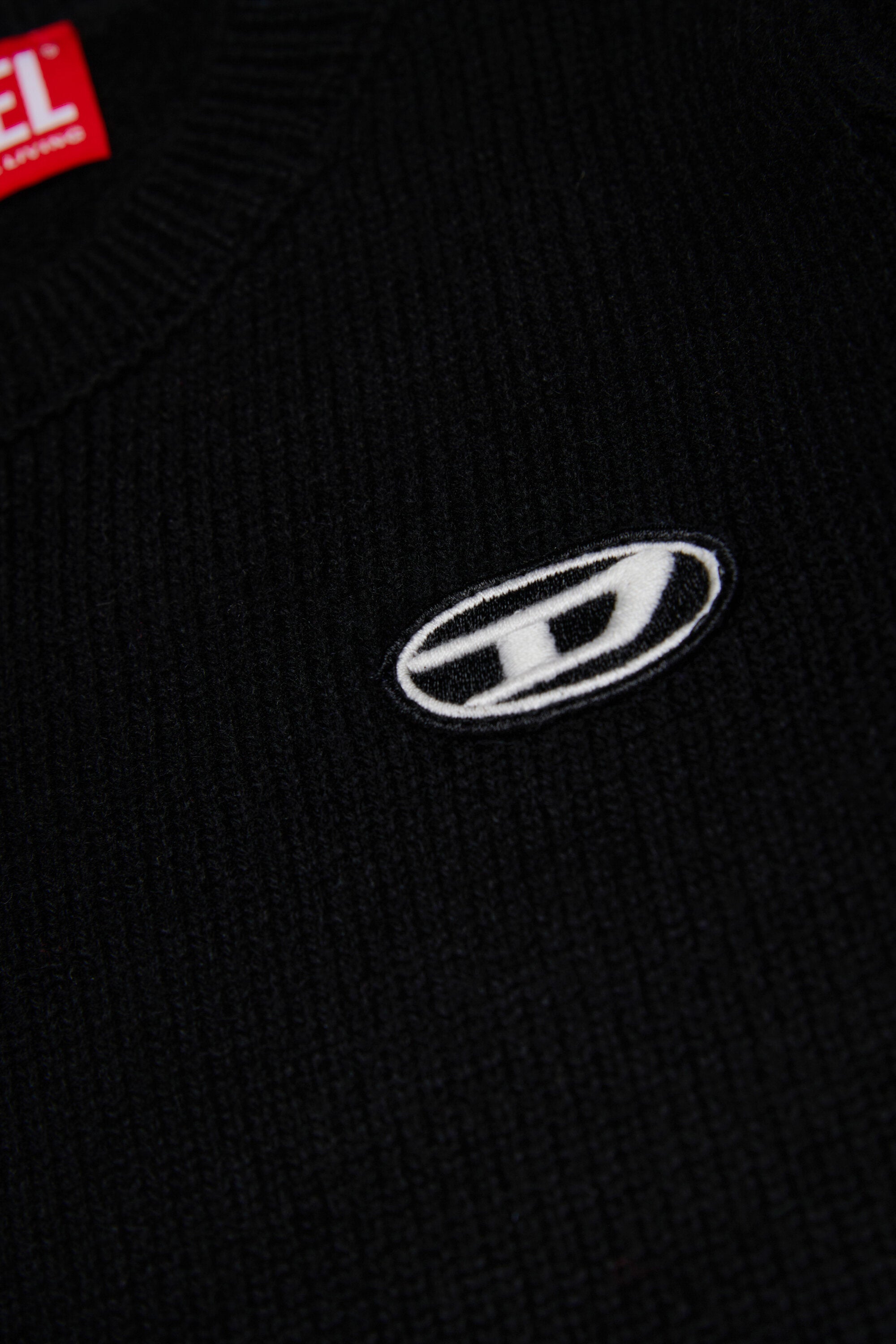 Wool and cashmere blend sweater with patches