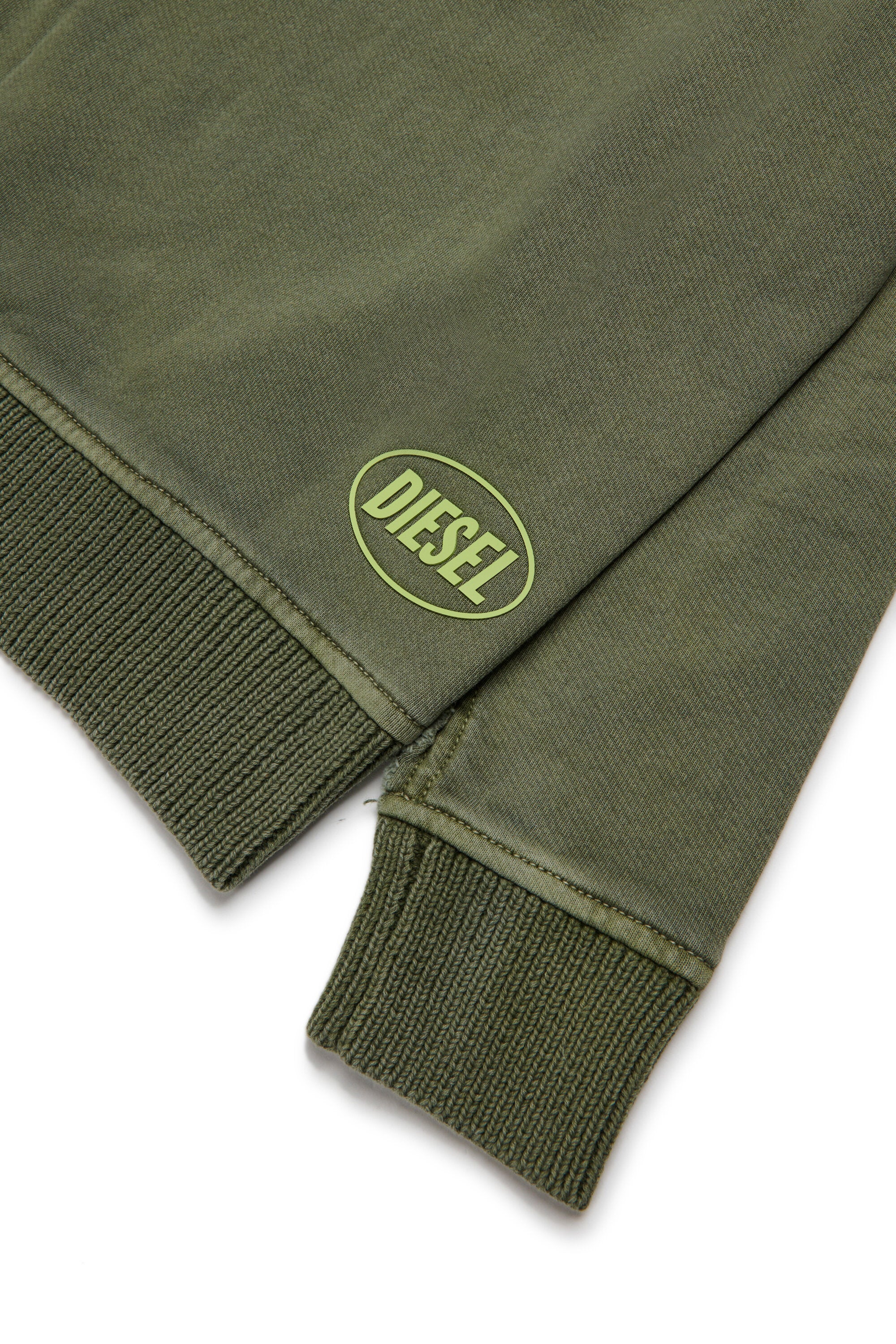 Sweater fleece and used-effect knit sweater