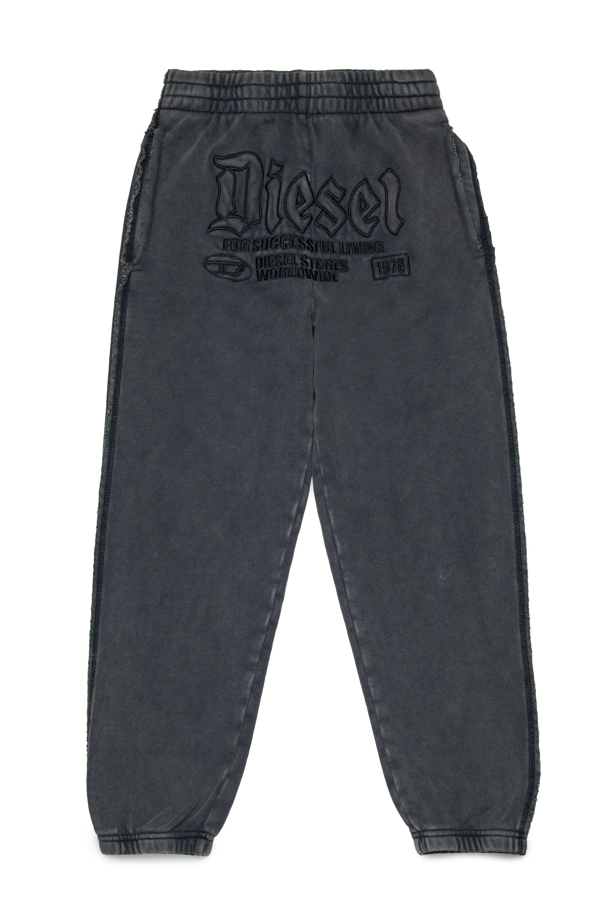 Jogger pants with gothic graphics