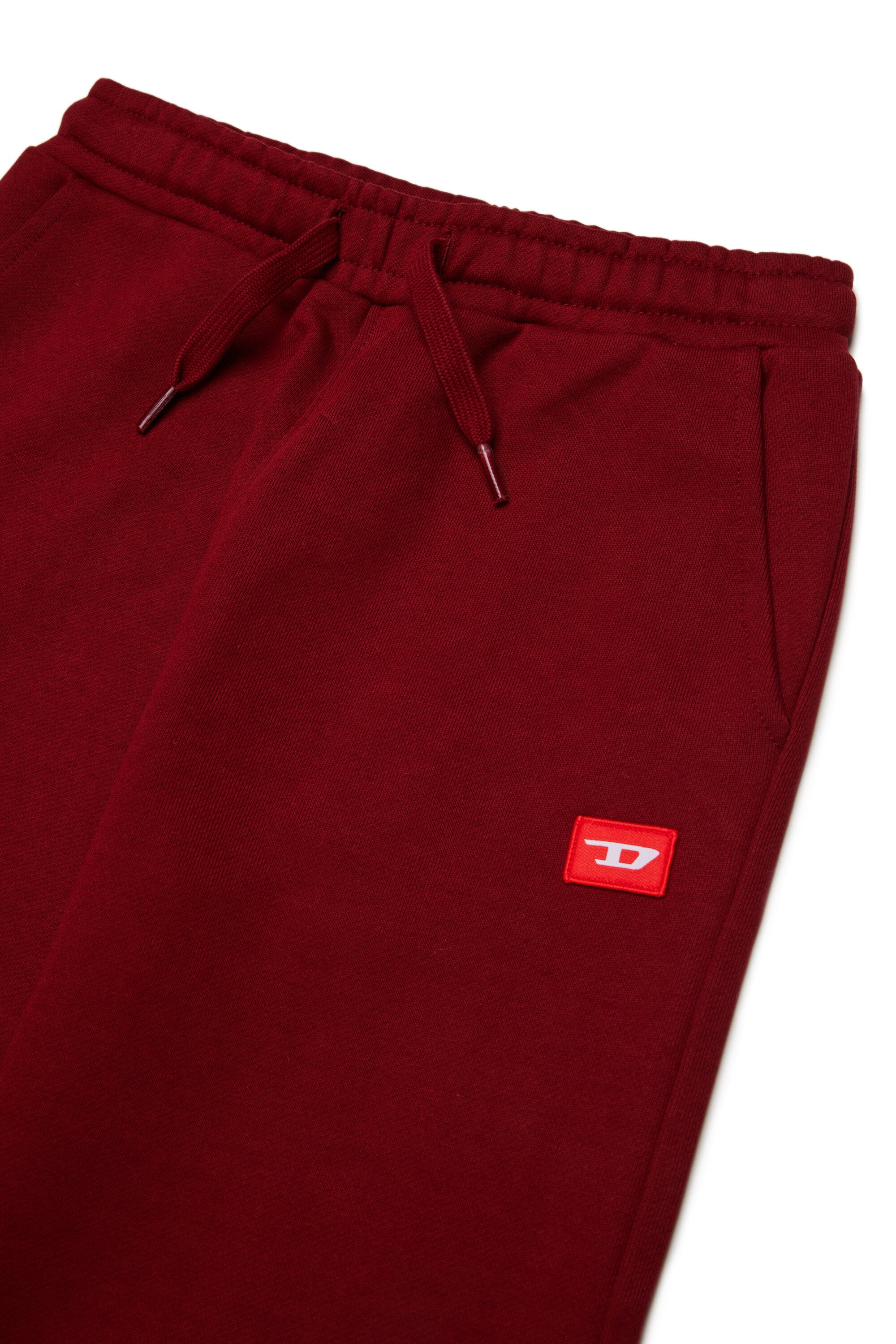Jogger pants with red D patch