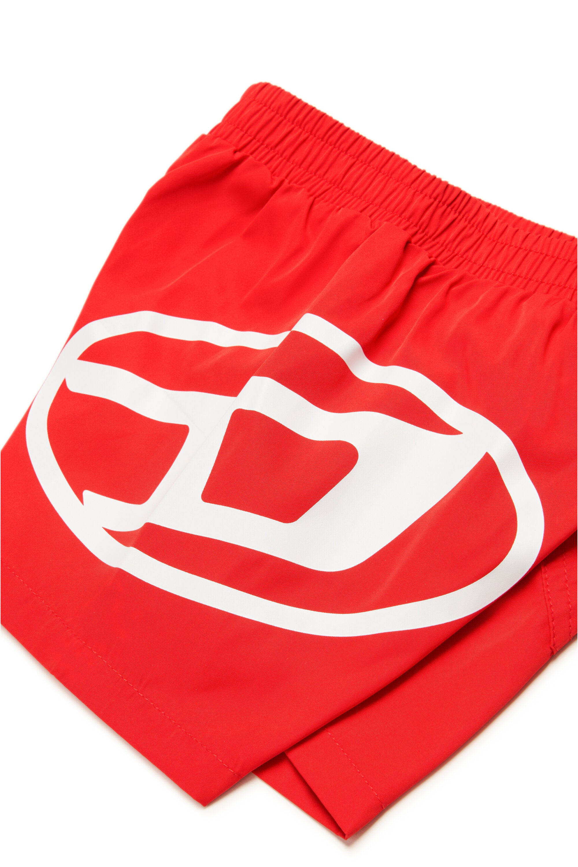 Boxer swimsuit branded with Oval D logo