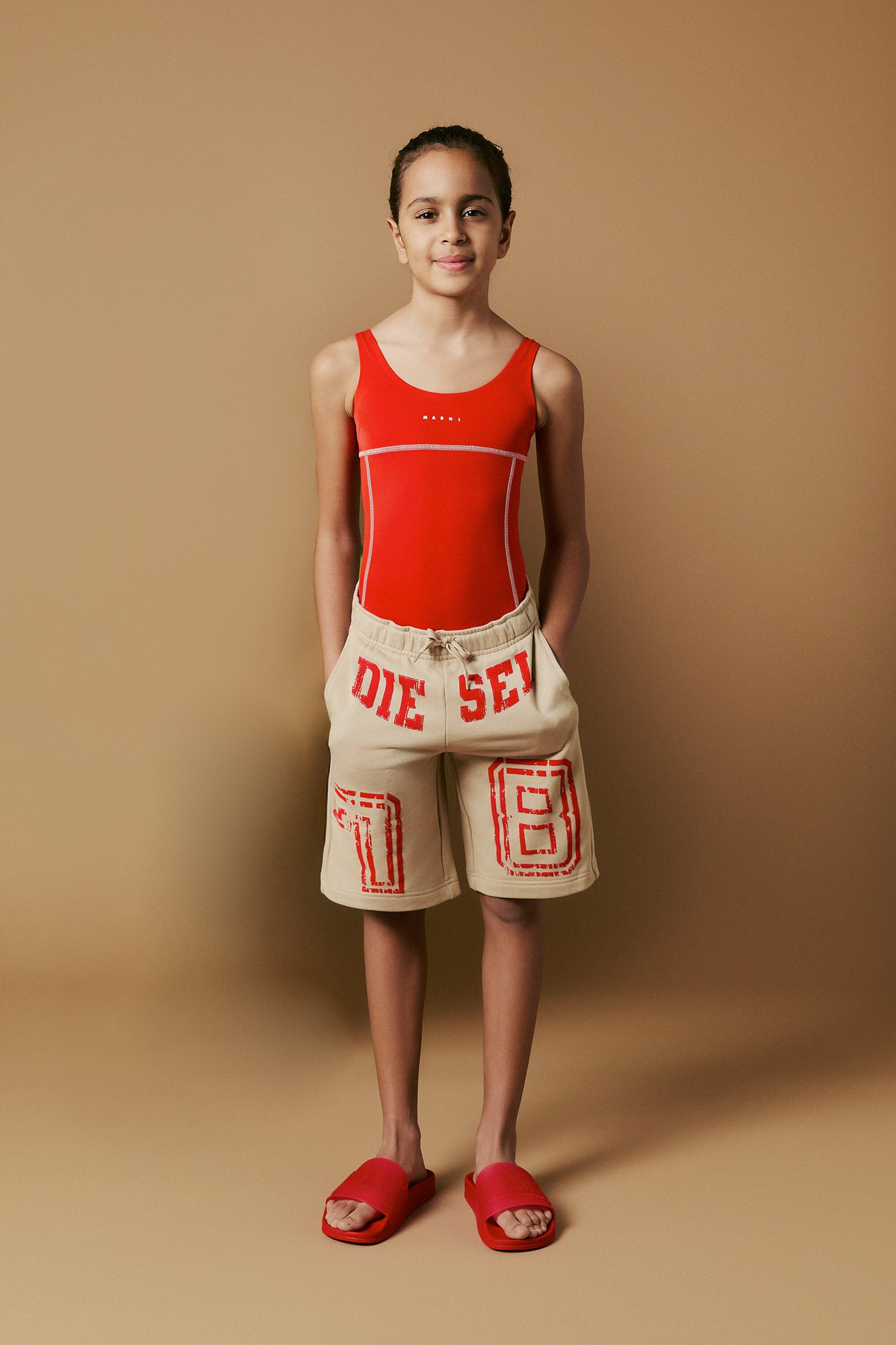 One-piece swimsuit with institutional logo