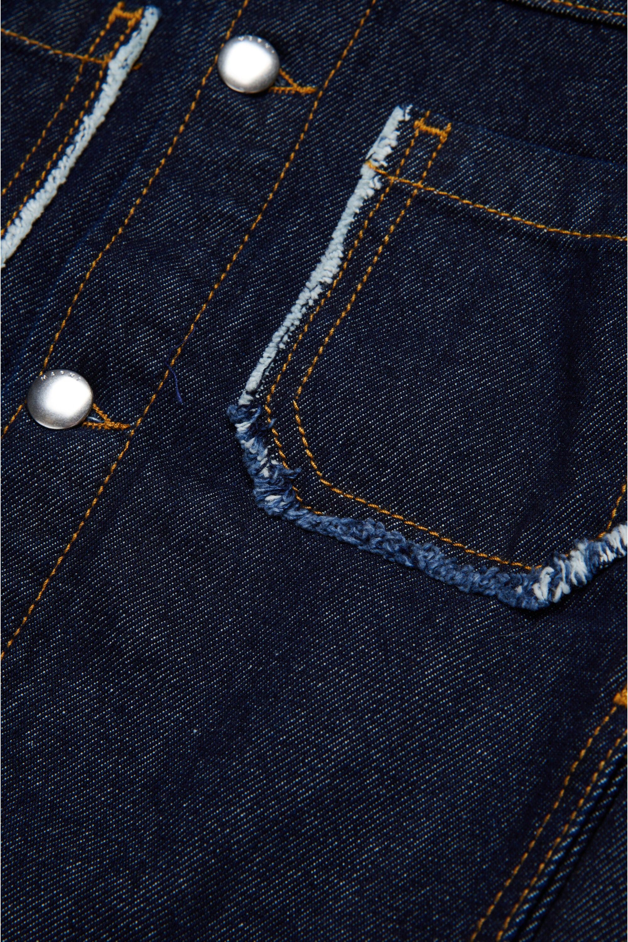 Dark denim jacket with frayed details