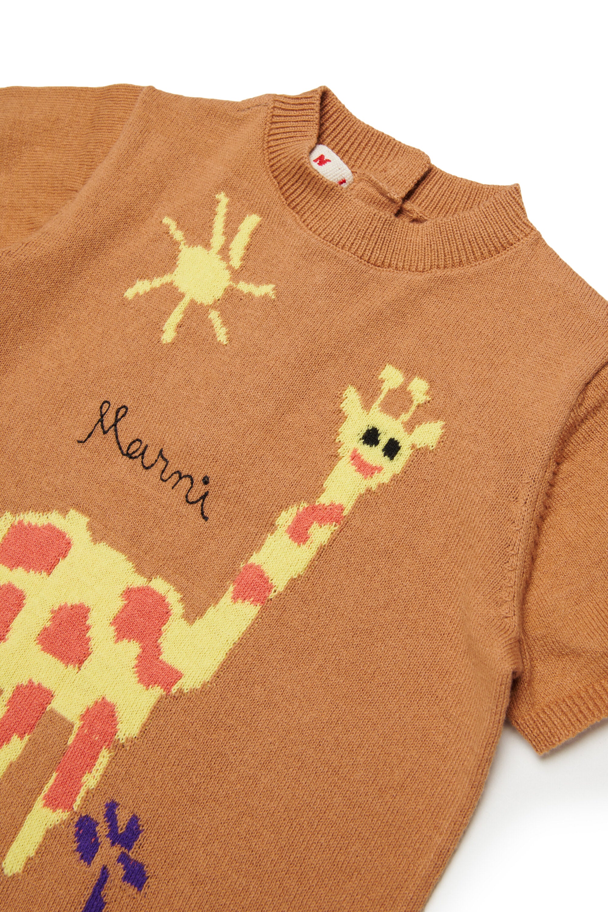 Baby jumpsuit with giraffe in jacquard fabric