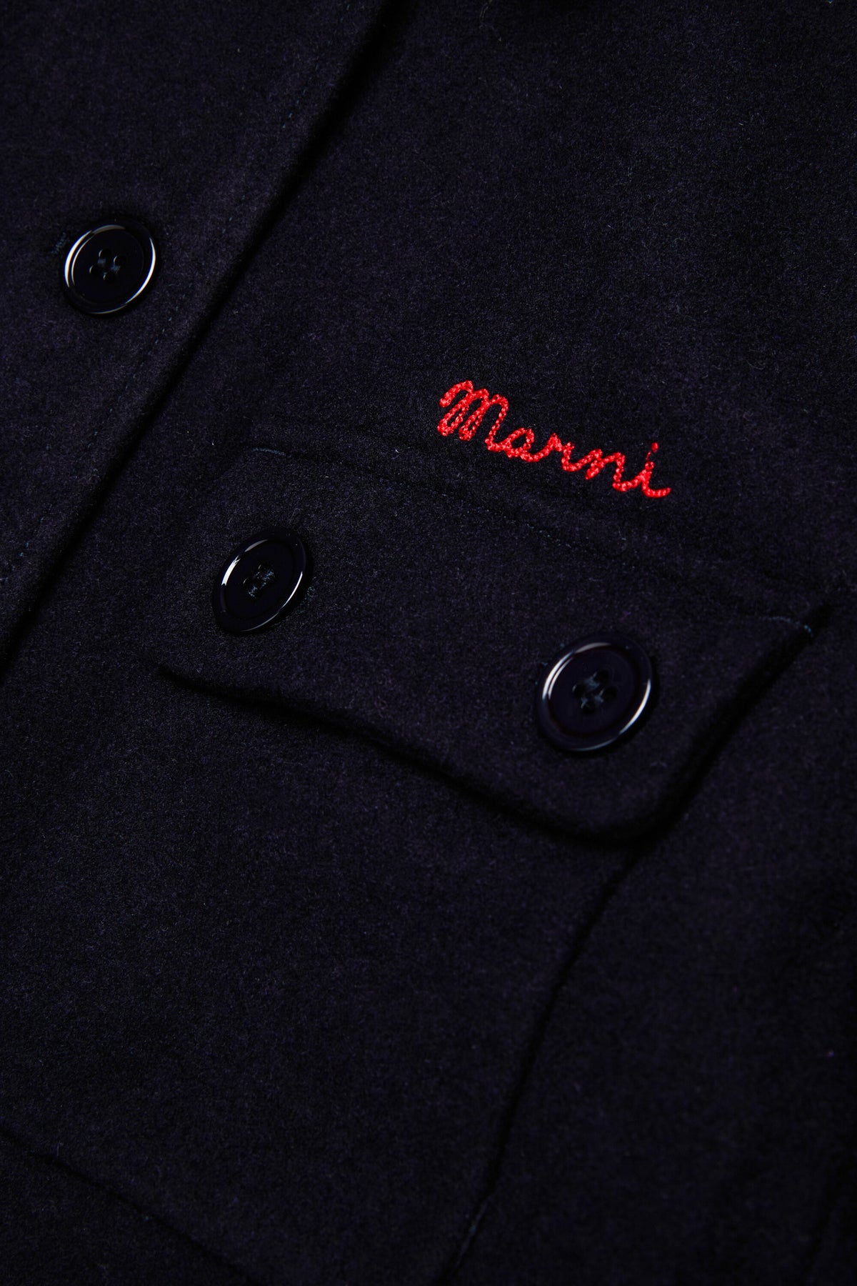 Coat with logo