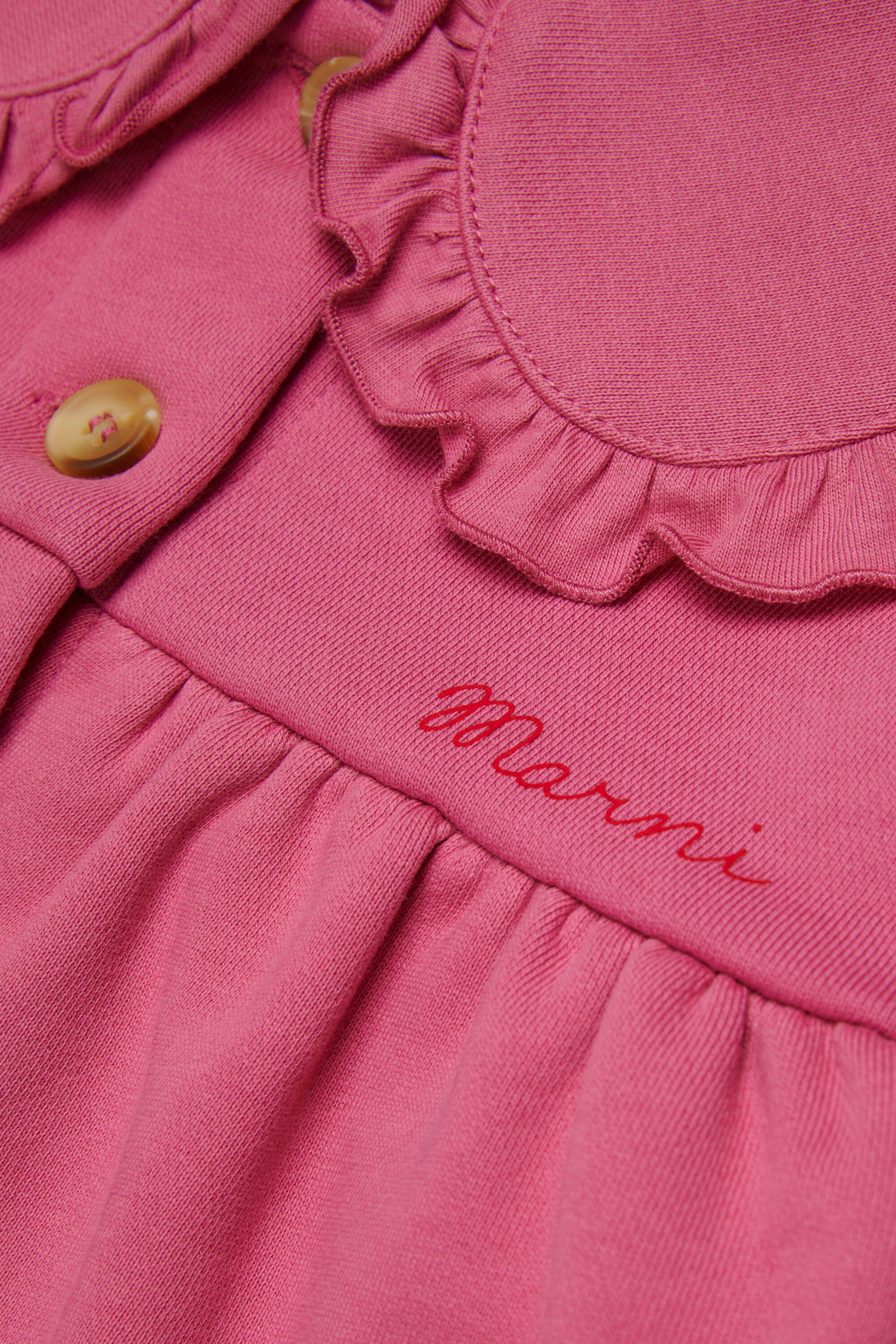 Jacket with logo and ruffles